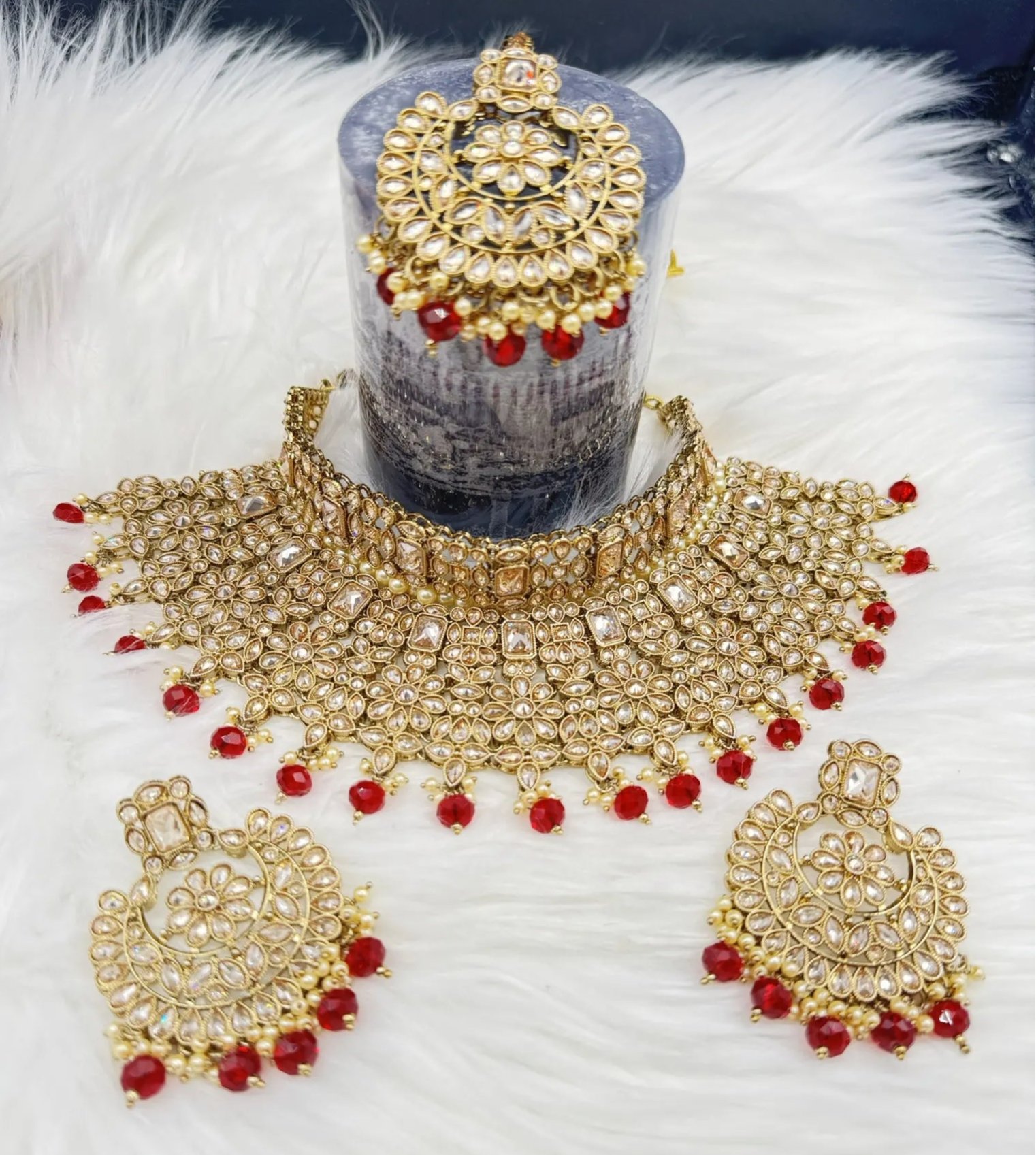 Gold-plated Indian bridal set with elegant earrings & teeka. Intricate detailing, waterproof, anti-tarnish