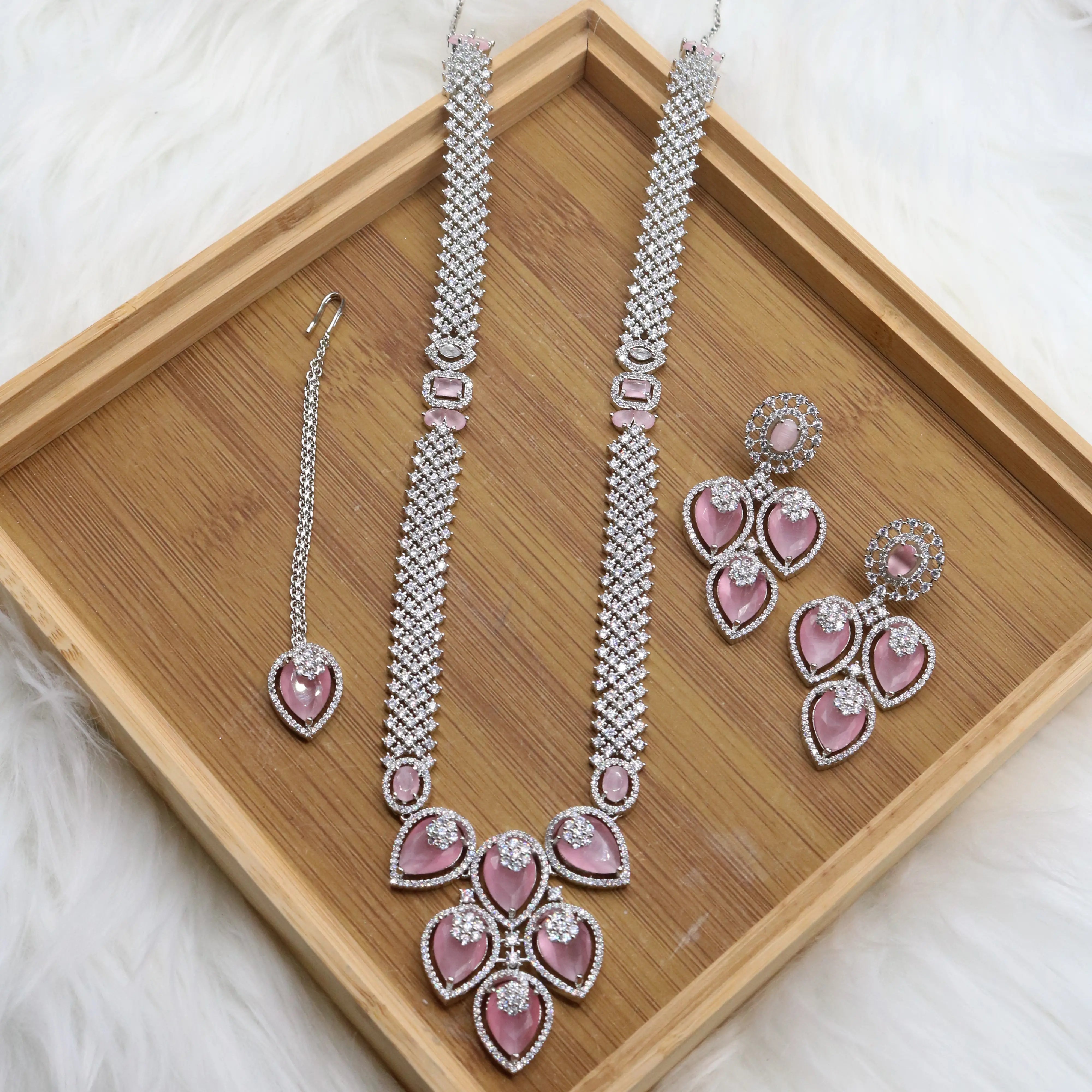 Silver and pink long bridal necklace set with earrings and teeka