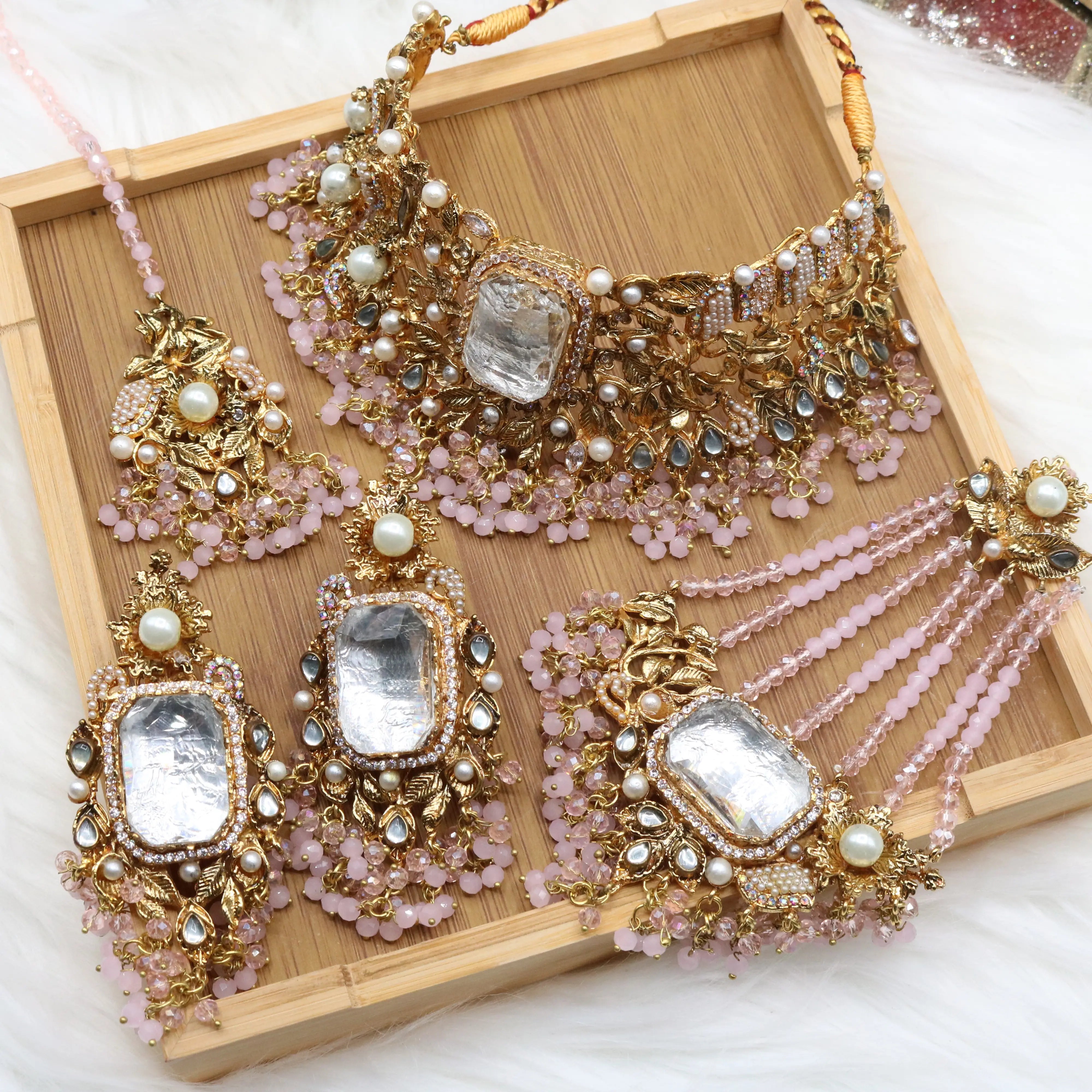 Pastel pink and gold Pakistani bridal choker jewelry set with jhoomer