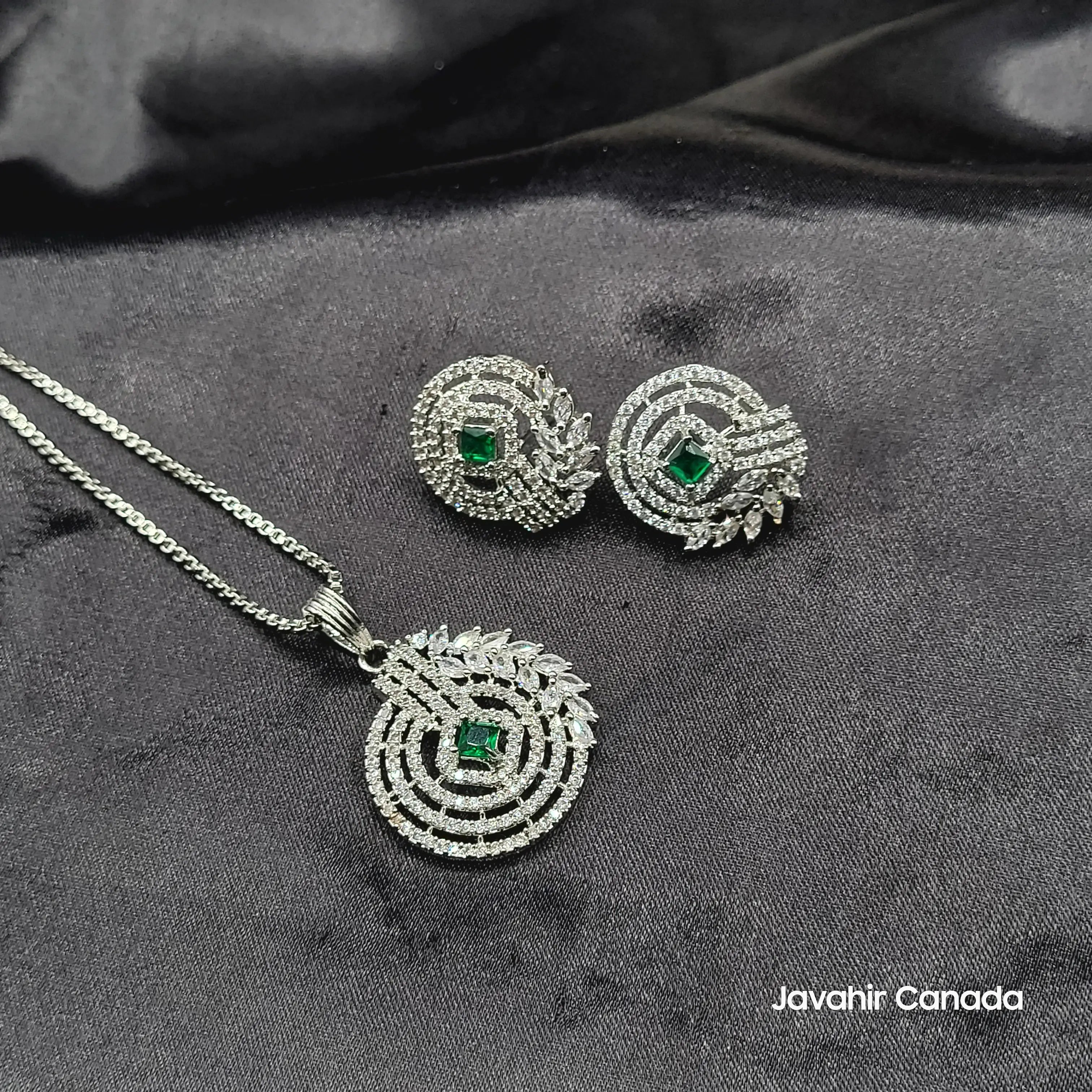 JV210 silver spiral round pendant set with emerald green center stone – Javahir Canada