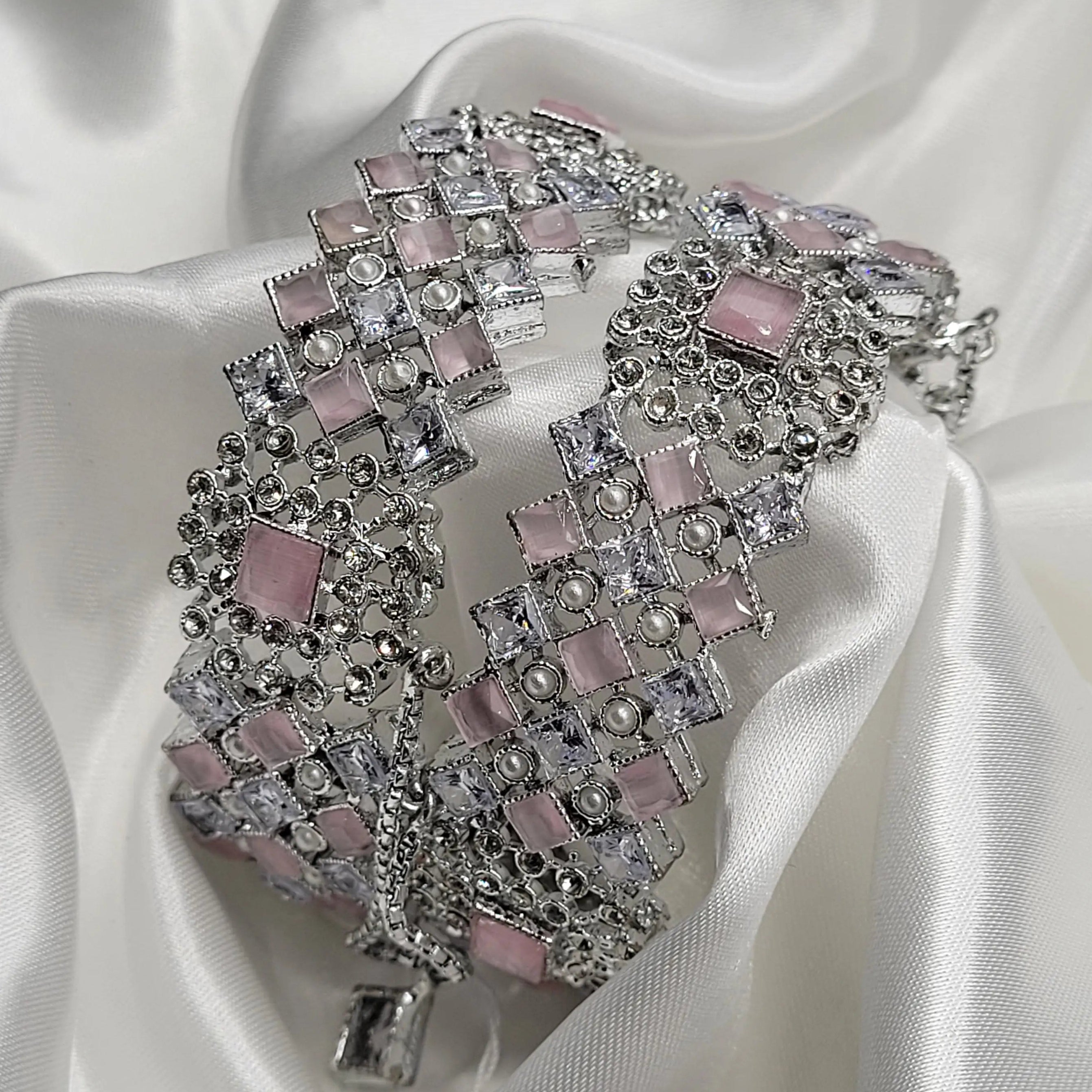 JV3023 silver bangles with pink stones and CZ crystals – angled close-up