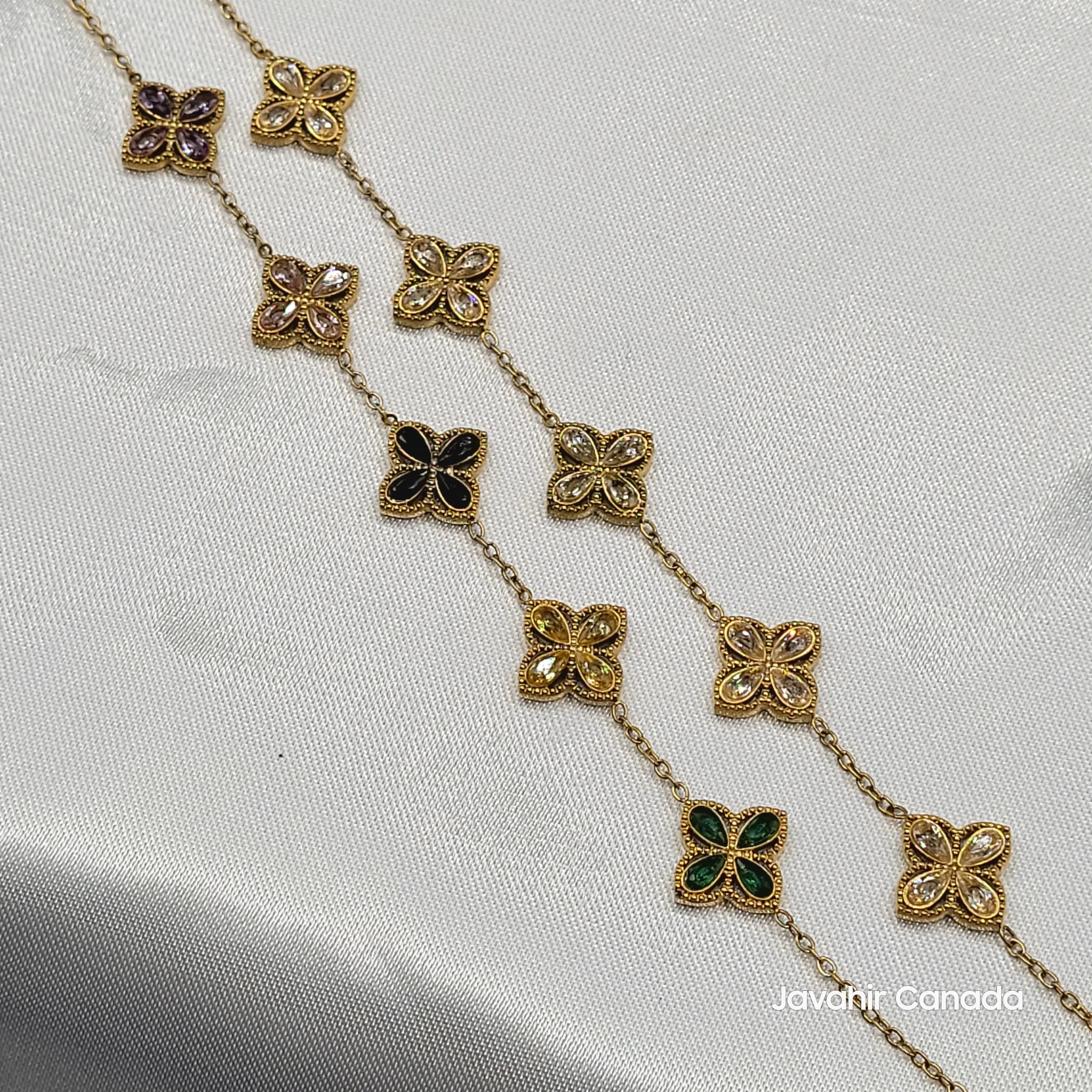 JV4011 floral charm bracelets in gold finish – one with multicolor stones, one with clear CZ stones