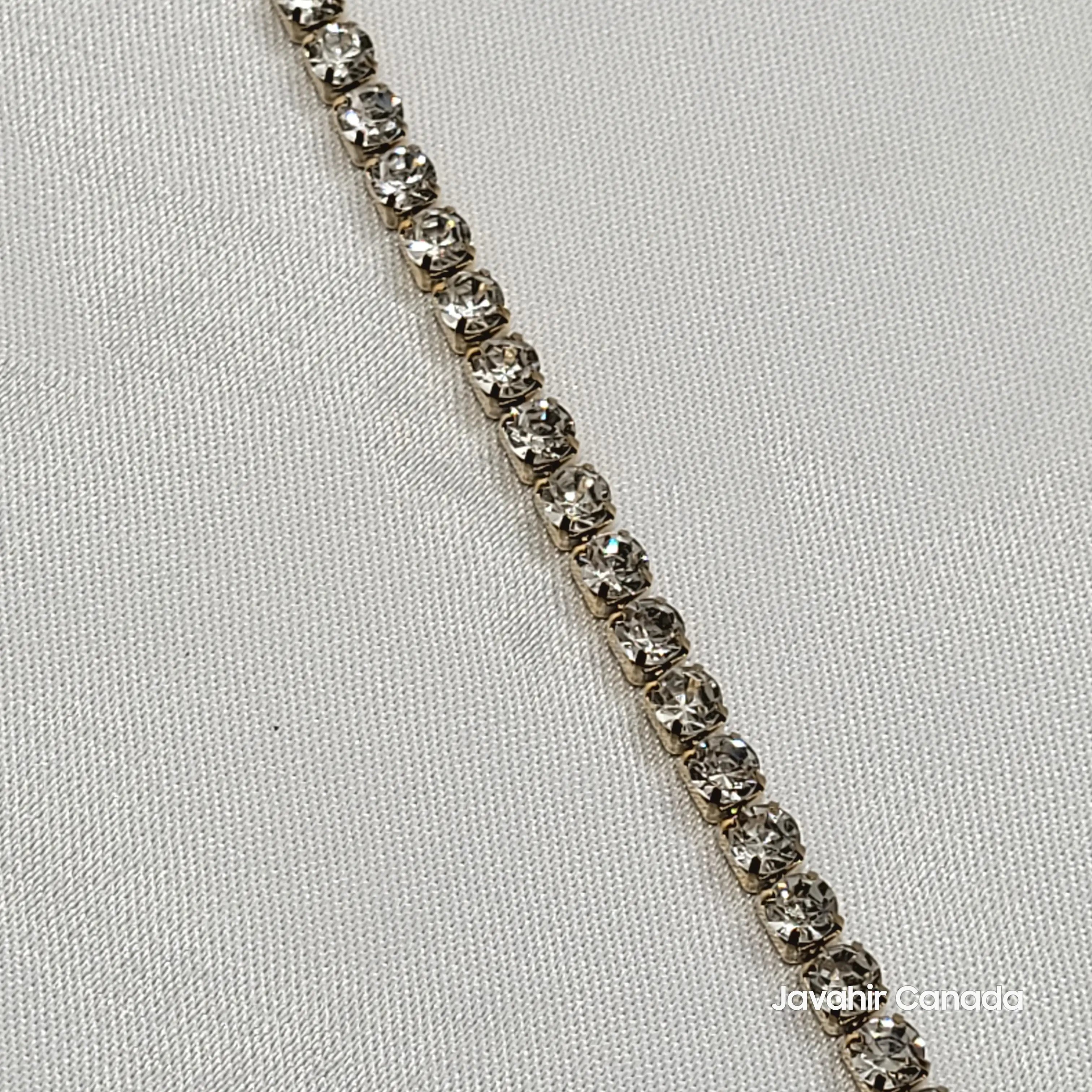 Close-up of JV4018 bracelet featuring round American diamonds in classic prong setting