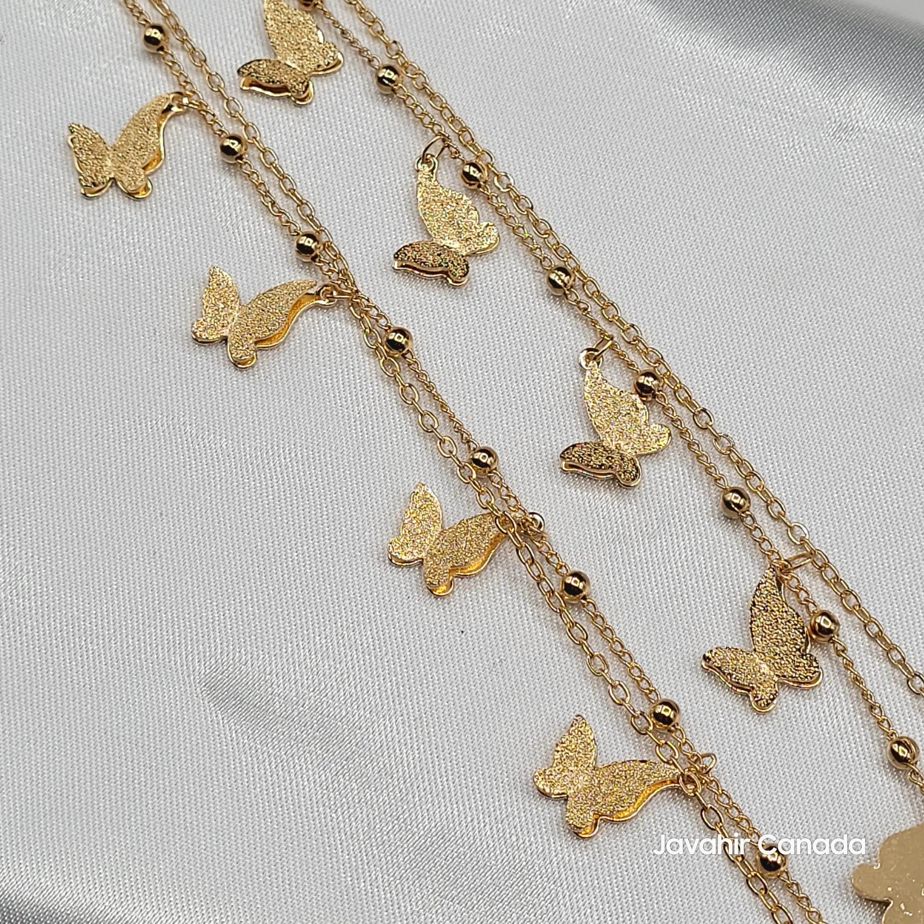 Gold plated butterfly anklet pair with double chains and bead accents – JV5001