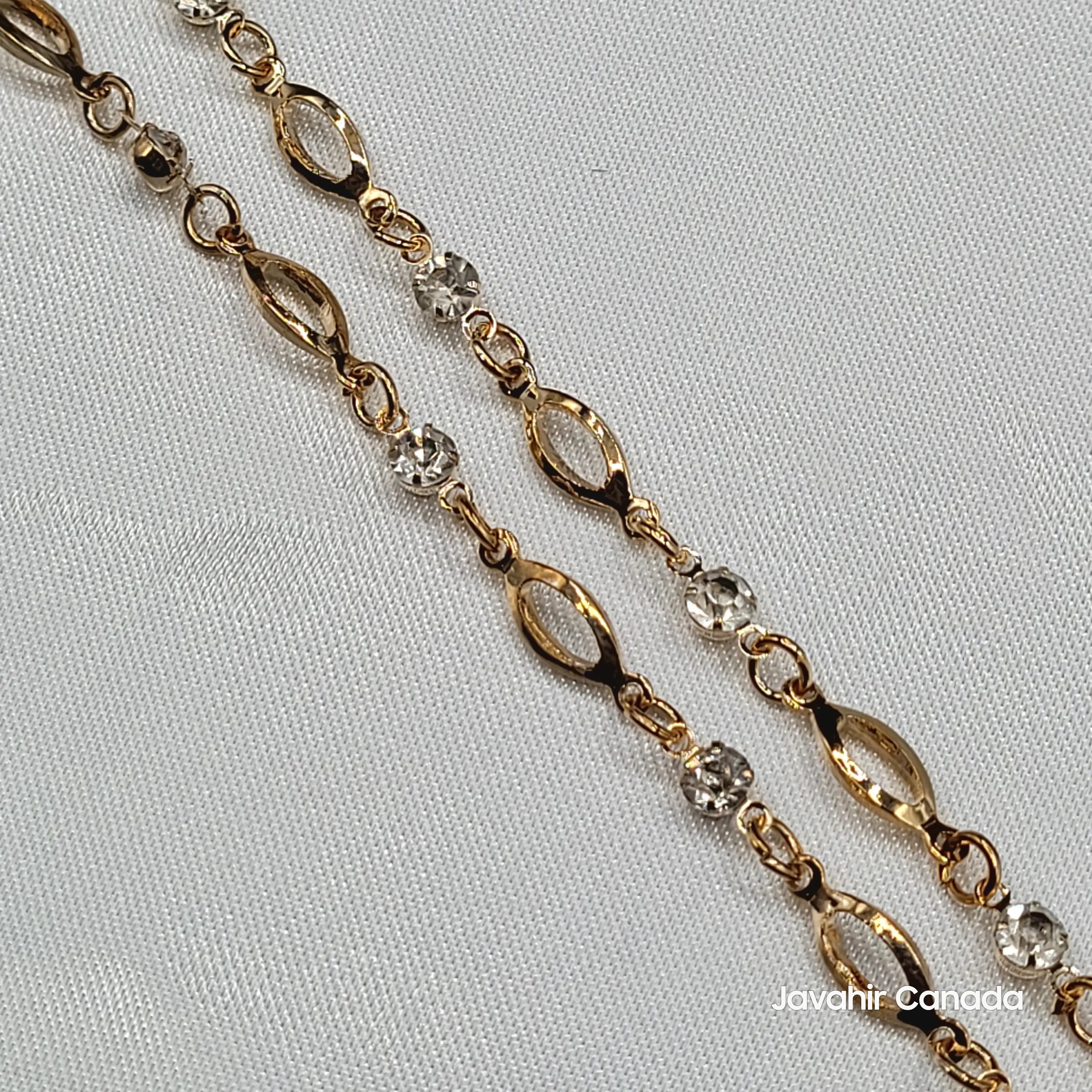 Close-up of JV5020 anklet showing gold oval cut-outs and round American diamond stones