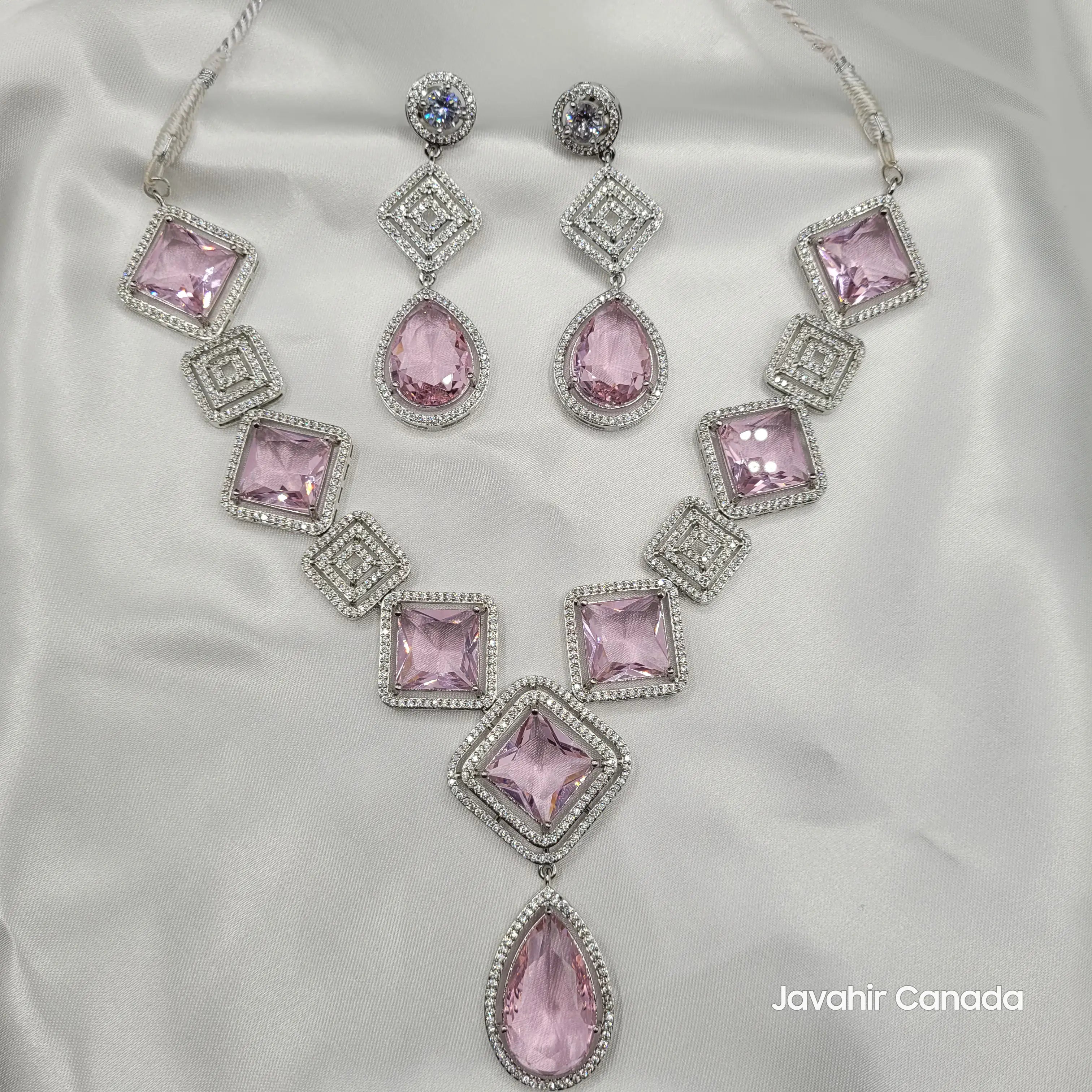 Full JV149 rose pink gemstone necklace and earring set on white satin.