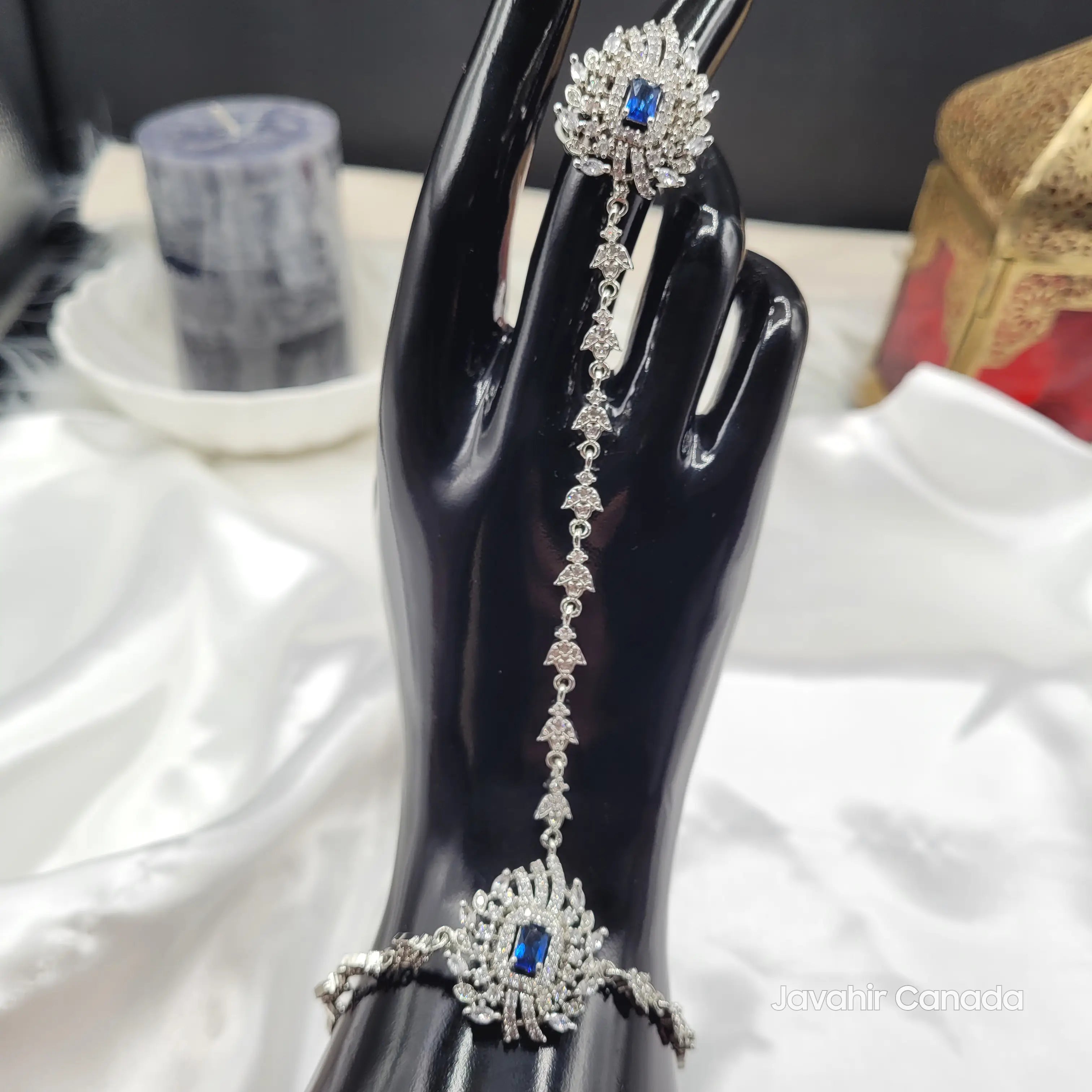 JV4027 Silver Sapphire Hathphool – Full front view on mannequin hand