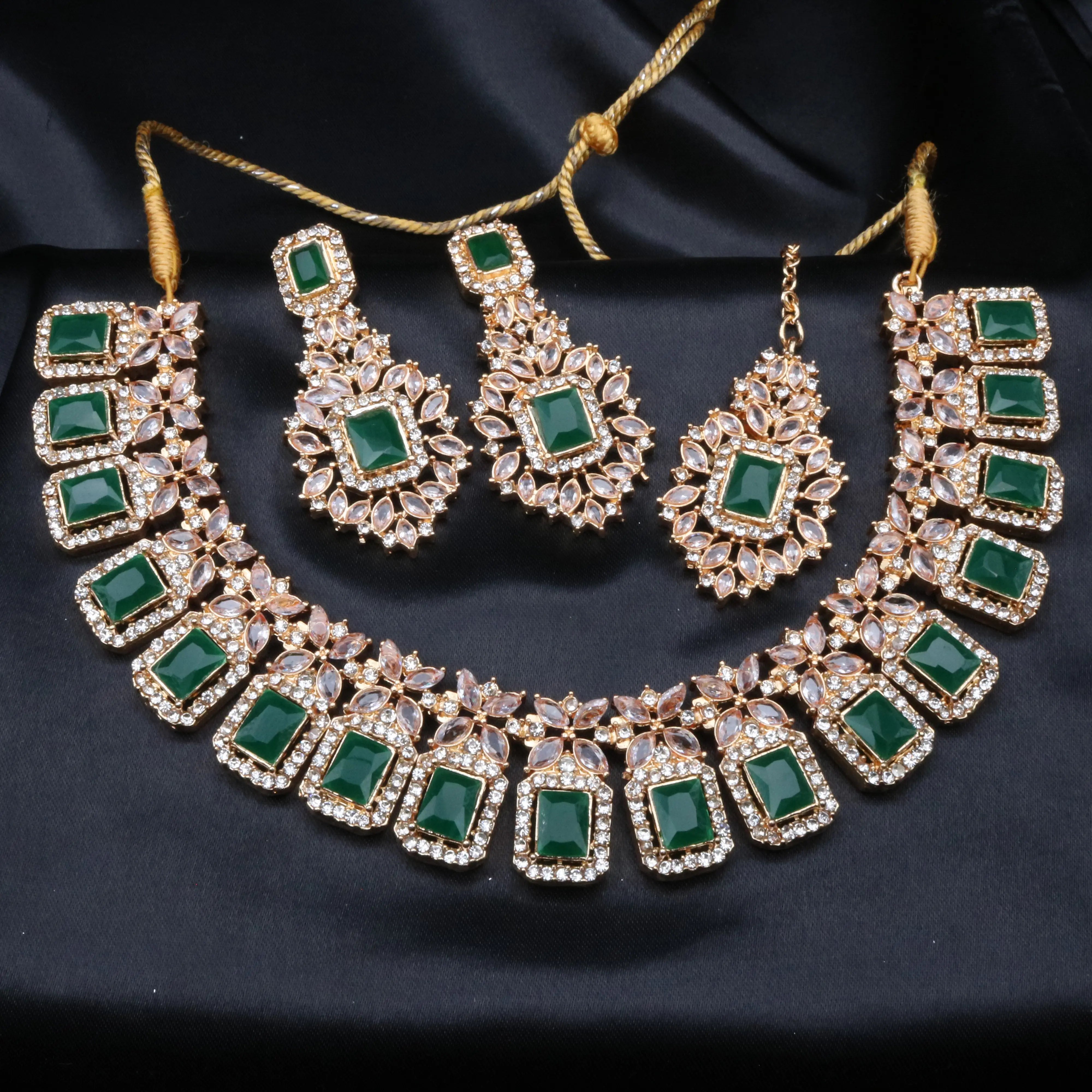Emerald green Pascal necklace set with matching earrings and teeka in gold finish