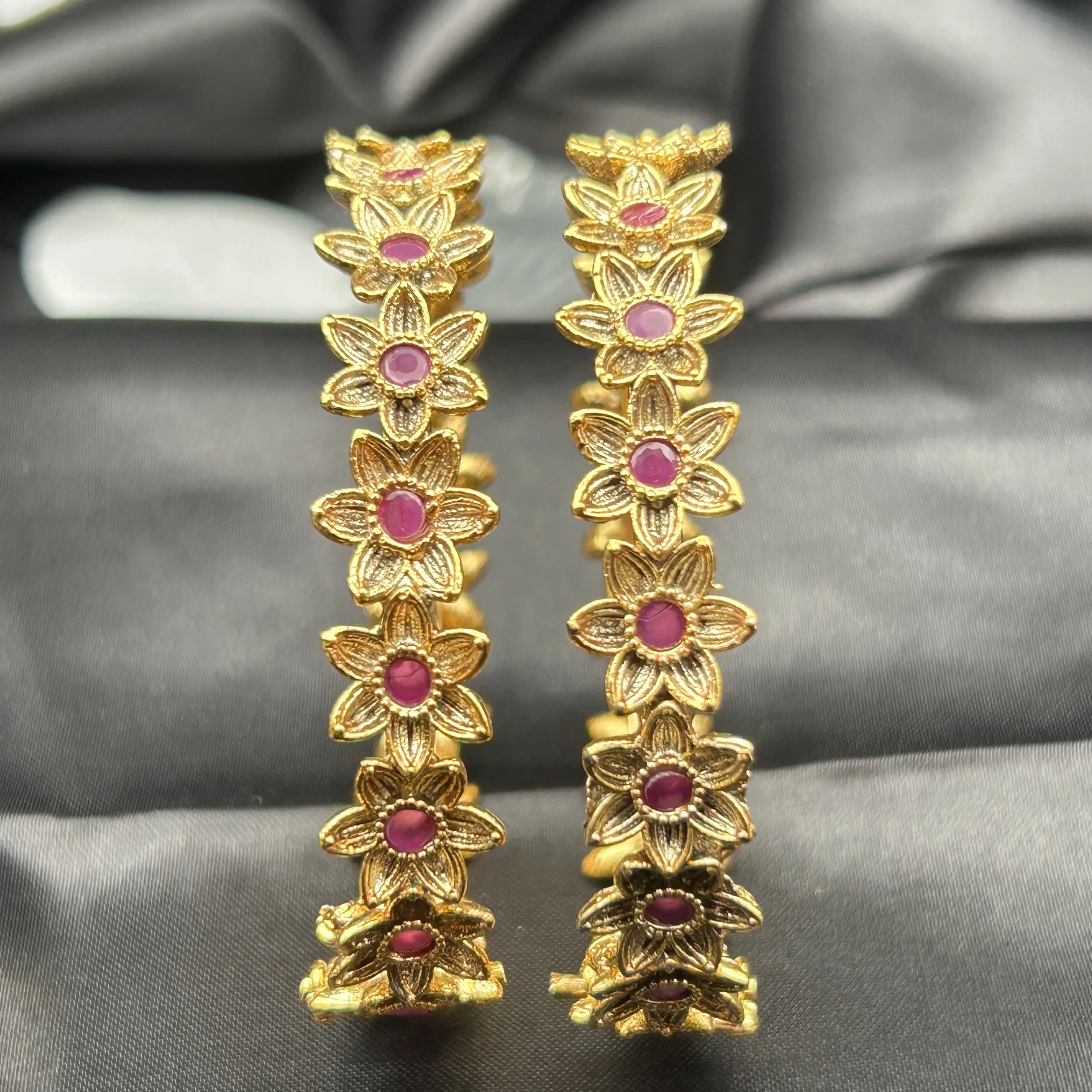 Pink-stone gold floral bangles with clasp design
