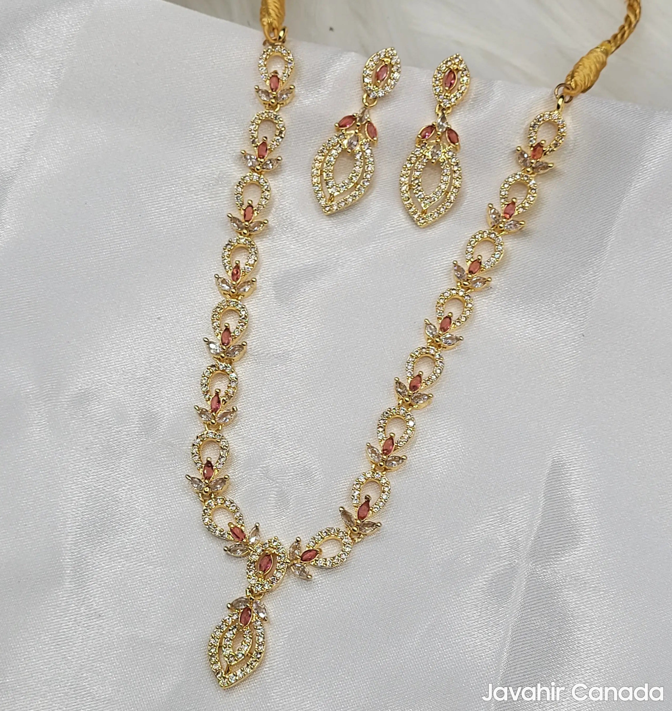 Full Cove necklace set with rose pink stones and gold-plated design.