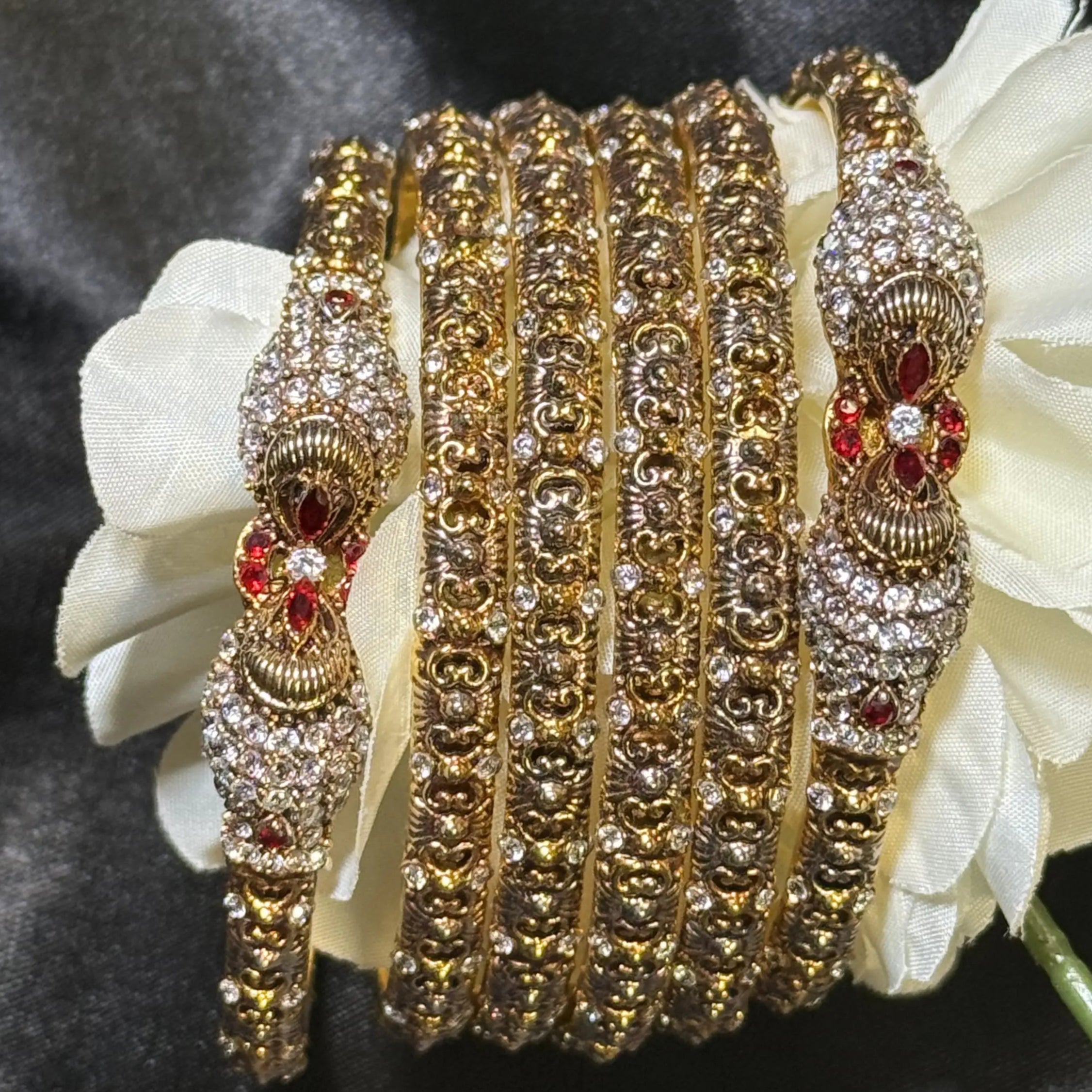 Antique 24K gold-plated bangles with red crystal ends