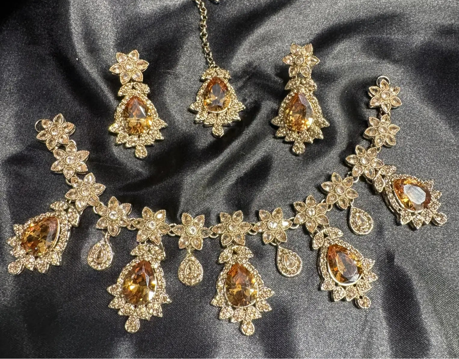 Traditional champagne jewelry set with pear-cut stones and CZ, floral design necklace, earrings, and teeka
