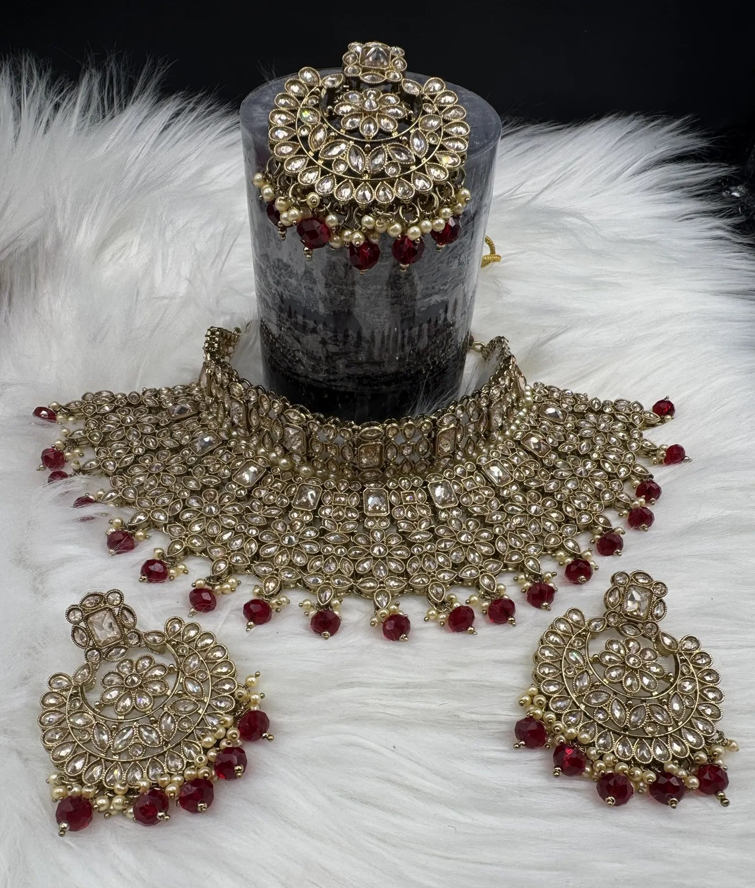 total view of Gold-plated Indian bridal set with elegant earrings & teeka. Intricate detailing, waterproof, anti-tarnish