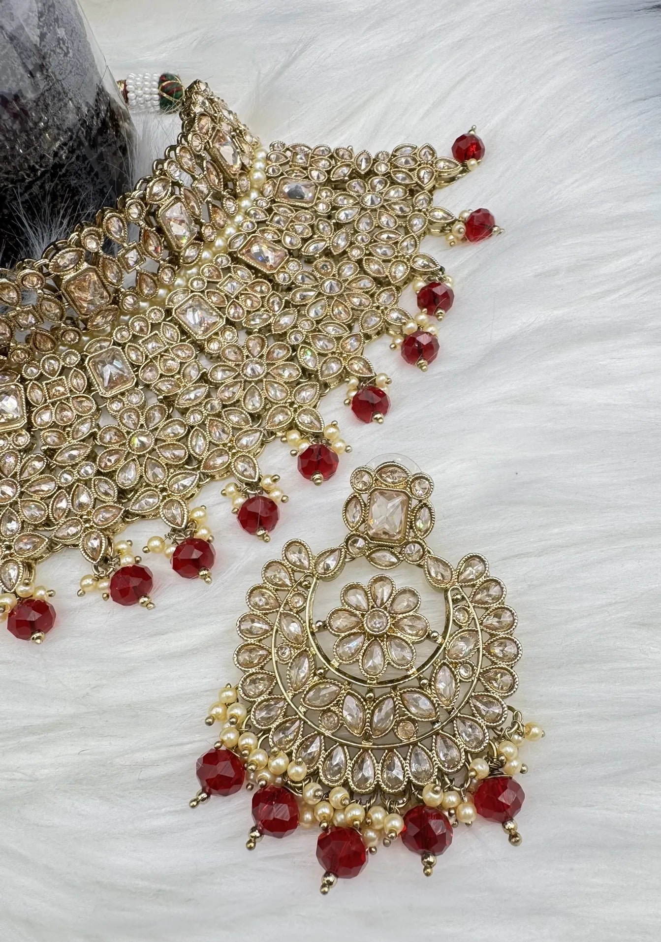 earring focused Gold-plated Indian bridal set with elegant earrings & teeka. Intricate detailing, waterproof, anti-tarnish