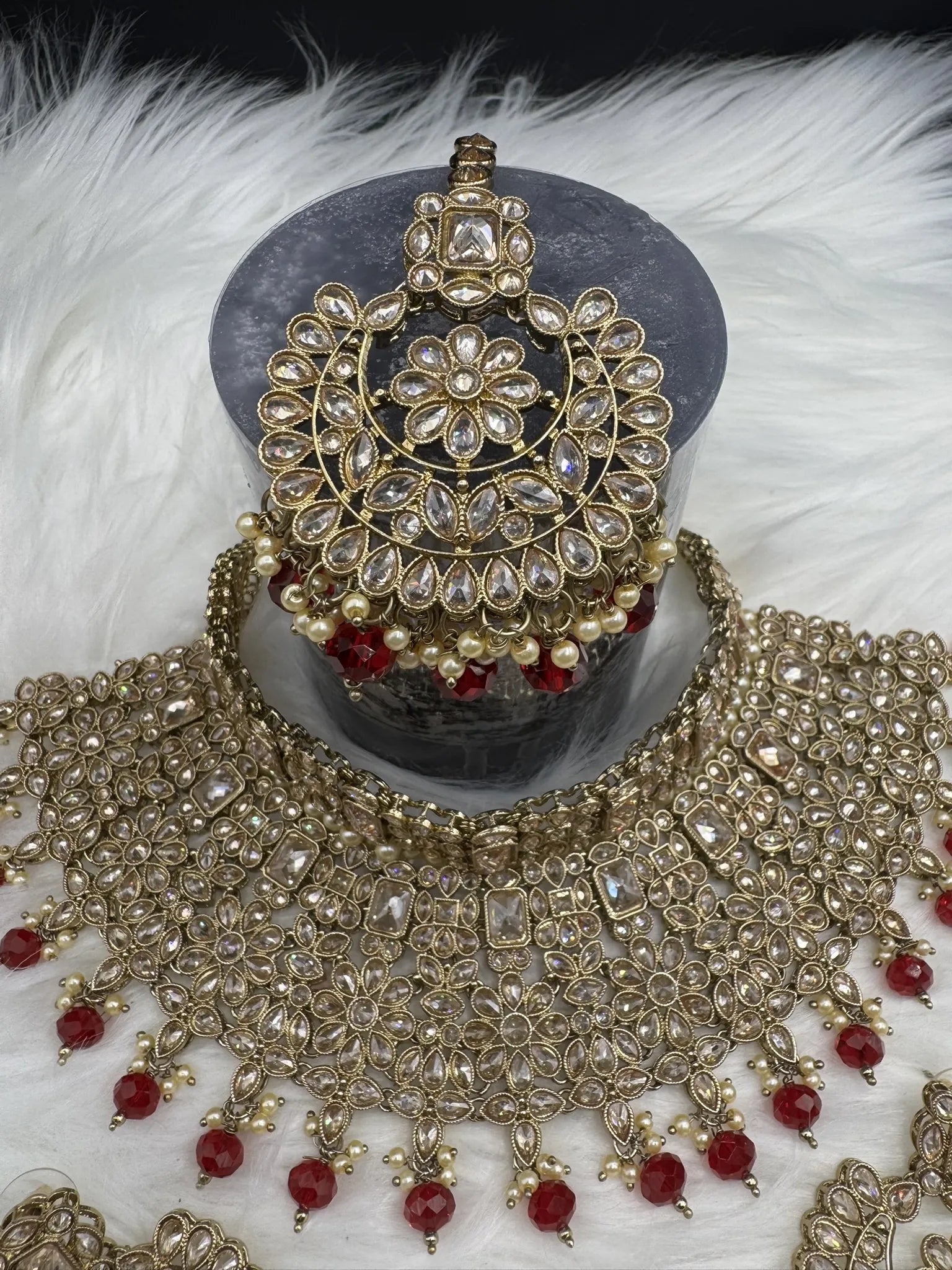 Gold-plated Indian bridal set with elegant earrings & teeka. Intricate detailing, waterproof, anti-tarnish