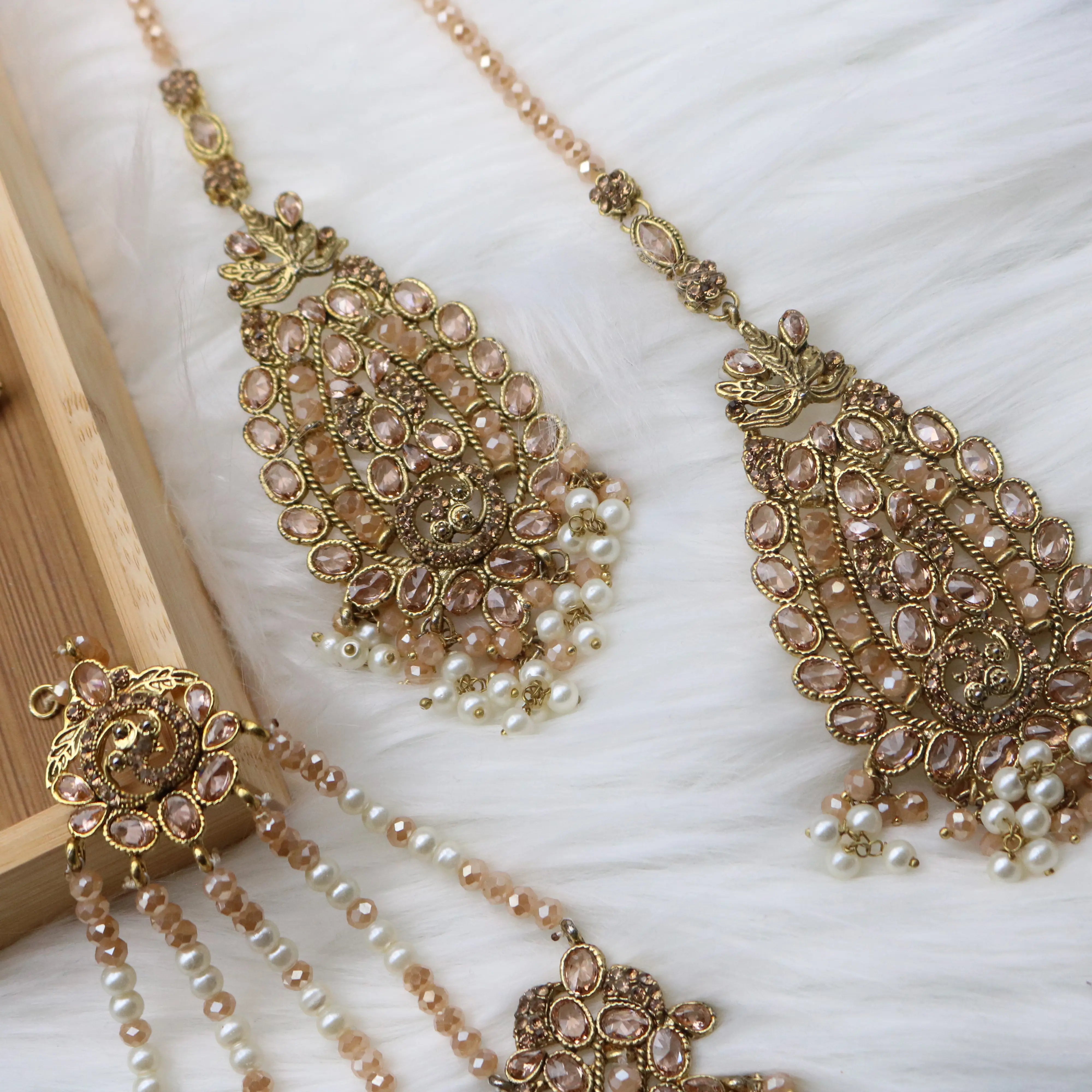 earrings view of Gold and champagne Pakistani bridal necklace jewelry set with jhoomer