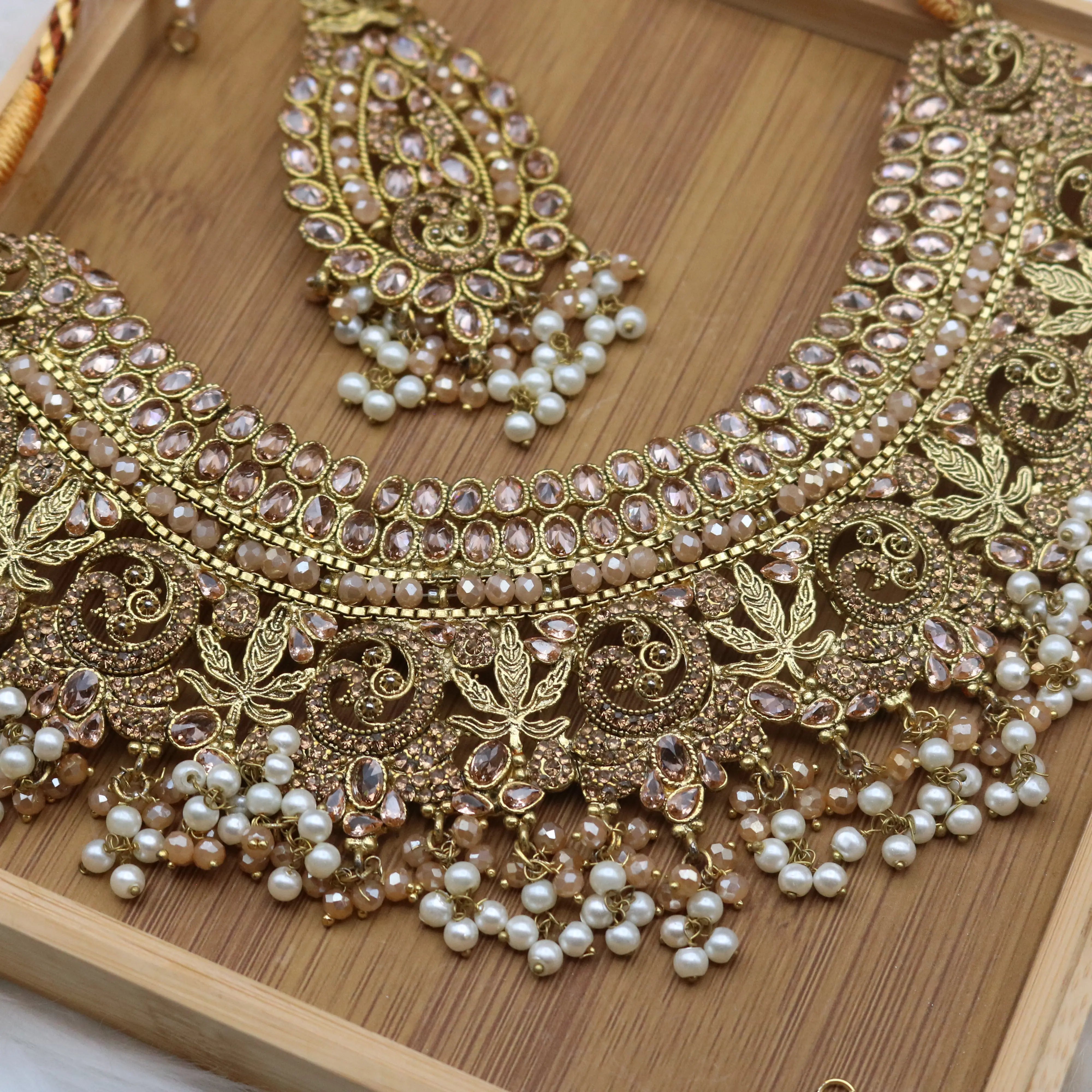necklace view of Gold and champagne Pakistani bridal necklace jewelry set with jhoomer