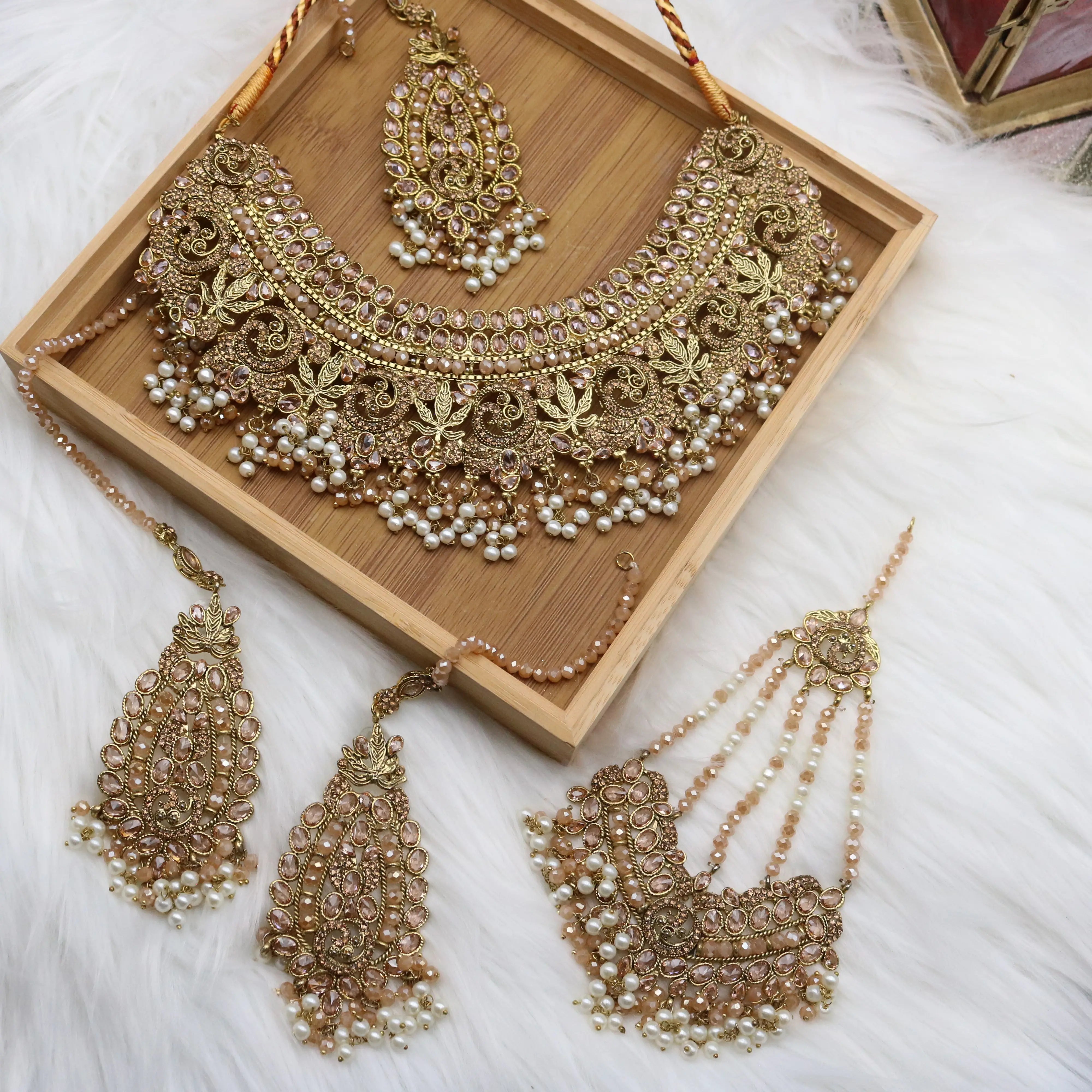 Heavy gold bridal necklace with matching earrings and jhoomer