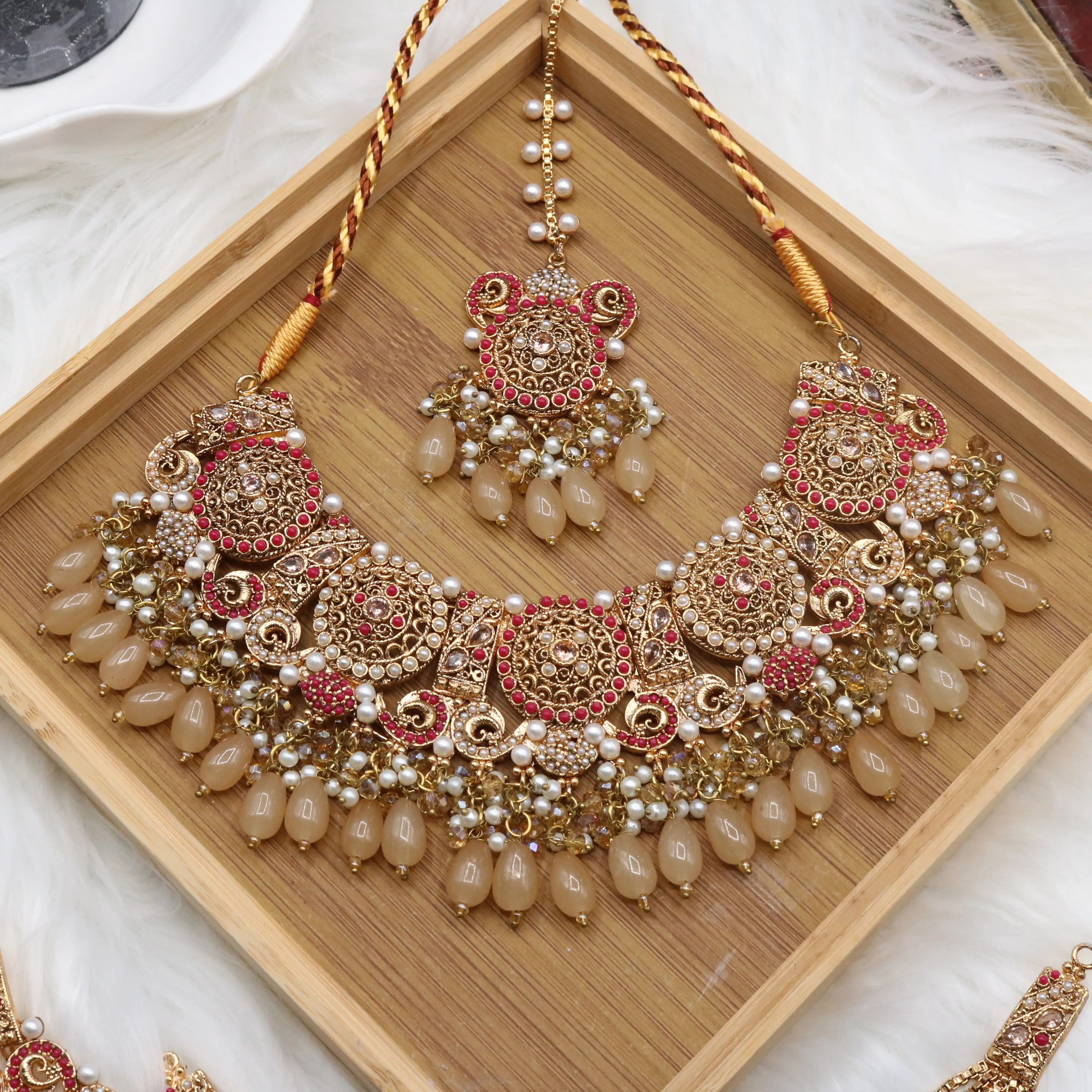 necklace view of Traditional bridal jewelry set with beige stones, pearls and antique gold finish
