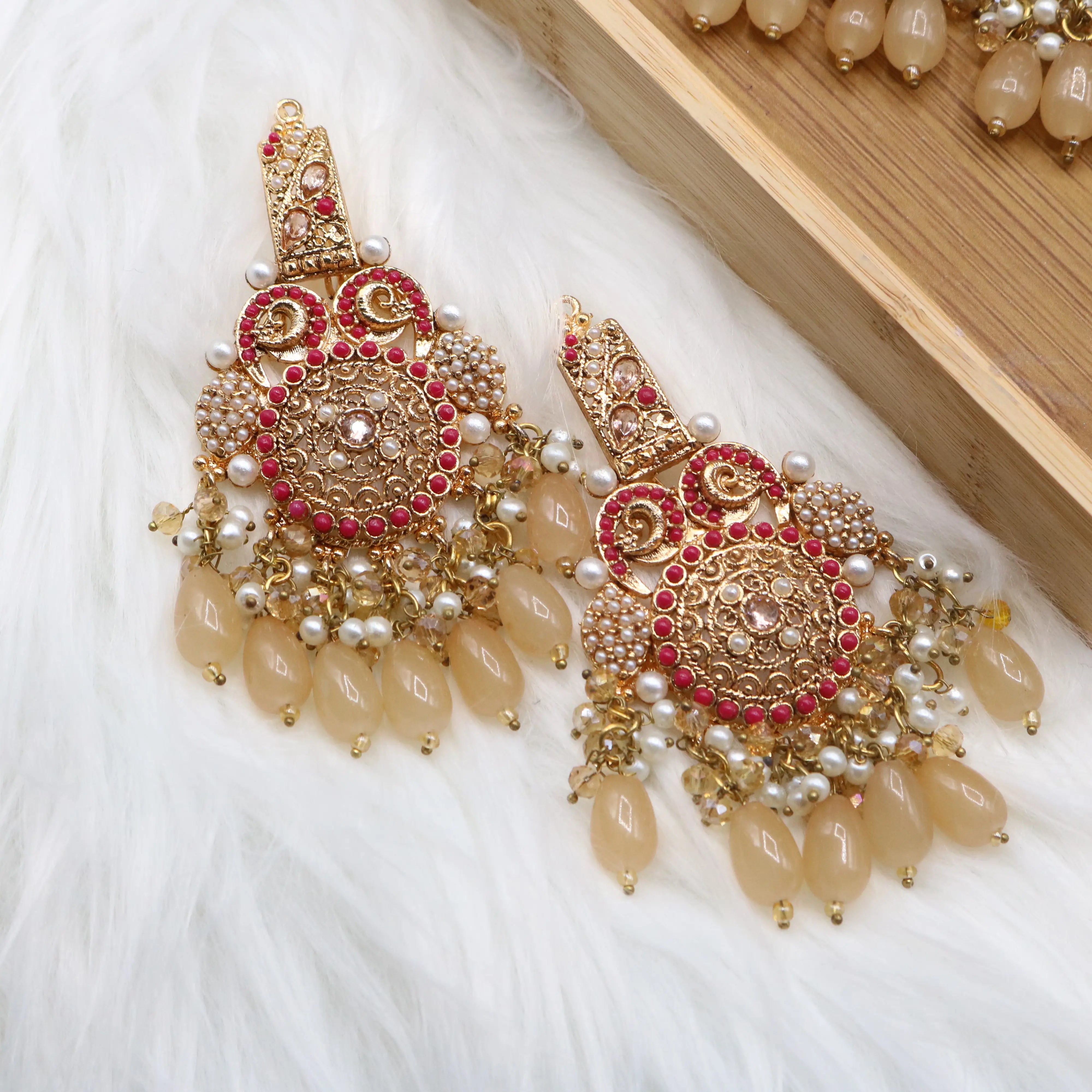 earring view of Traditional bridal jewelry set with beige stones, pearls and antique gold finish