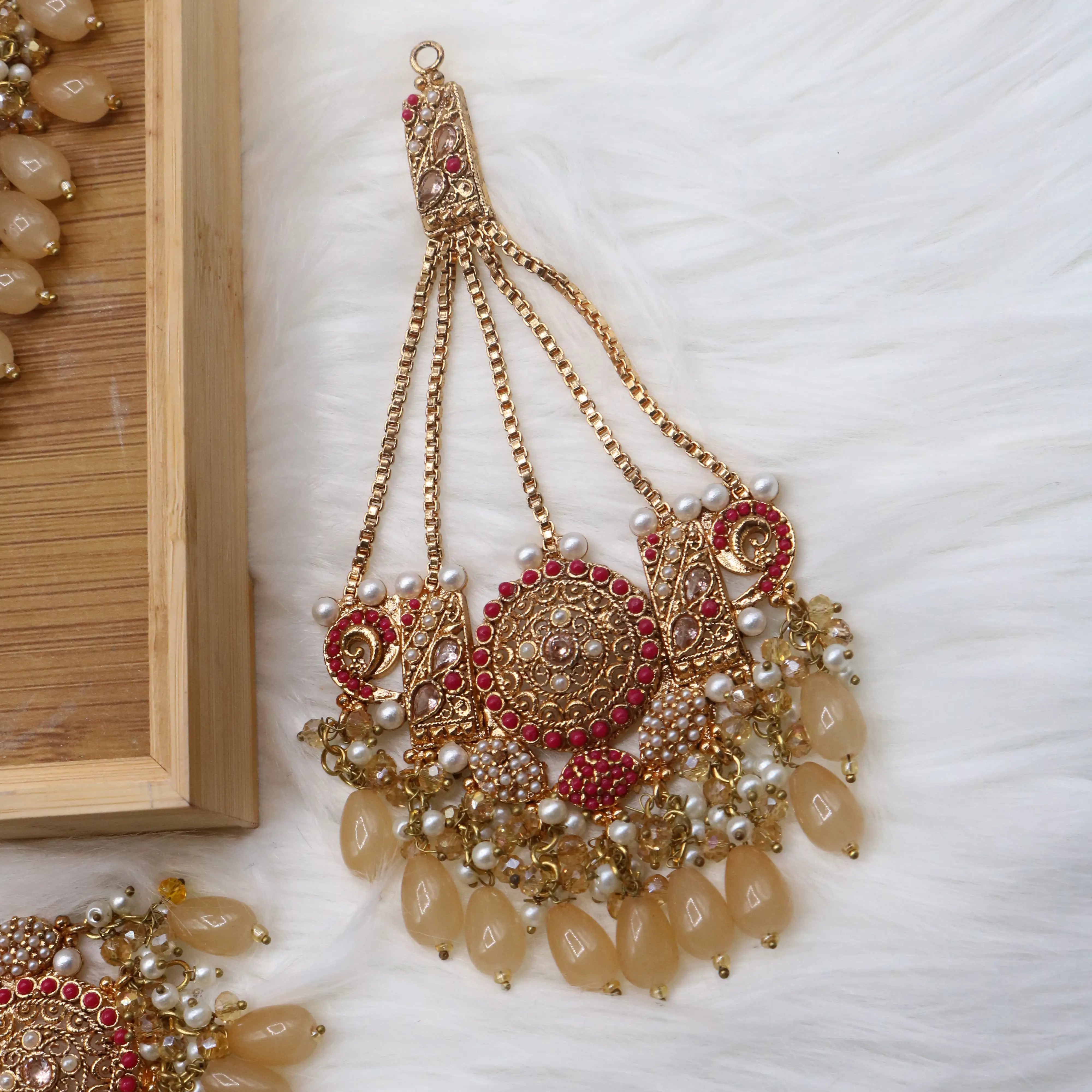 jhoomer view of Traditional bridal jewelry set with beige stones, pearls and antique gold finish