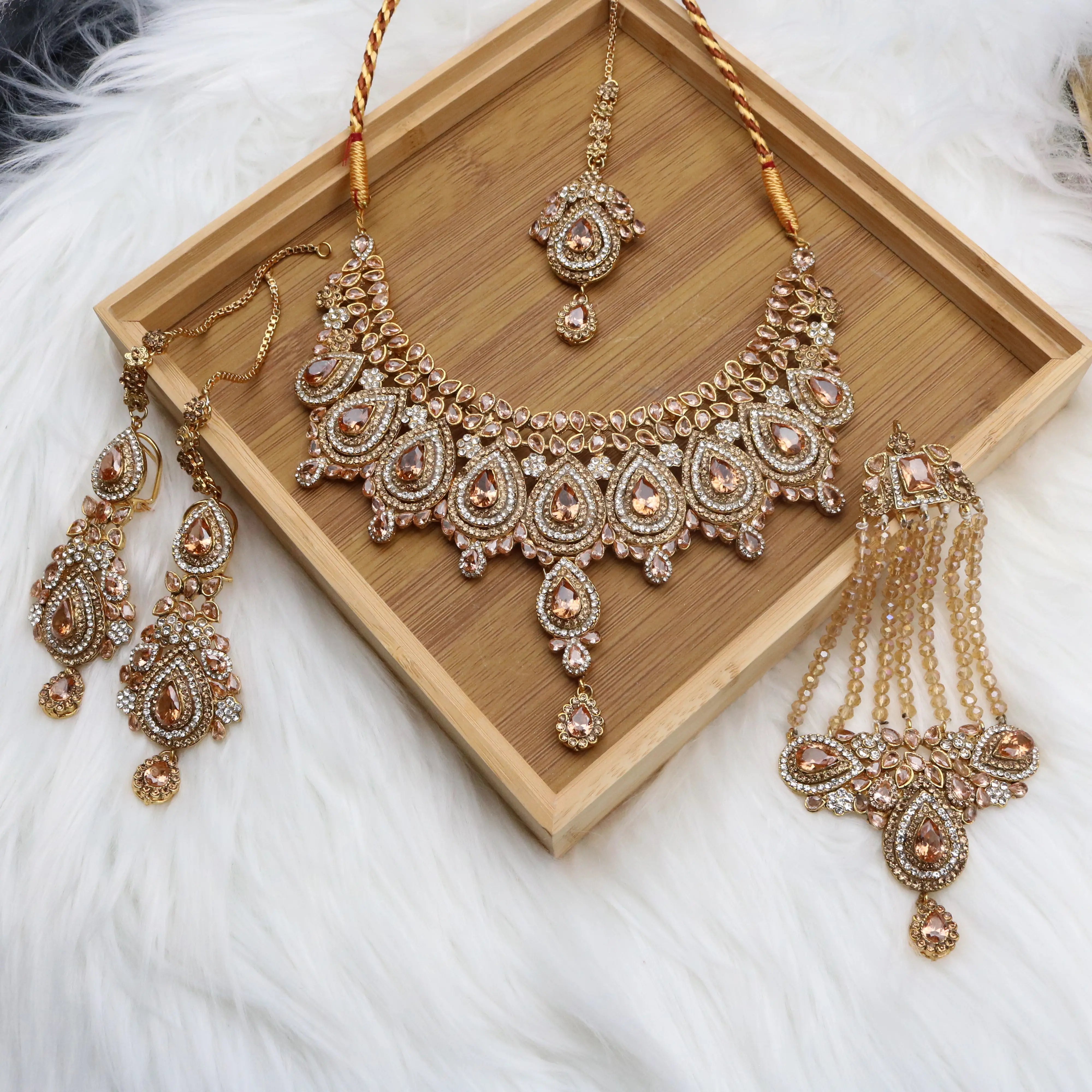 closer view of Champagne teardrop bridal necklace set with earrings, teeka & jhoomer in stainless steel