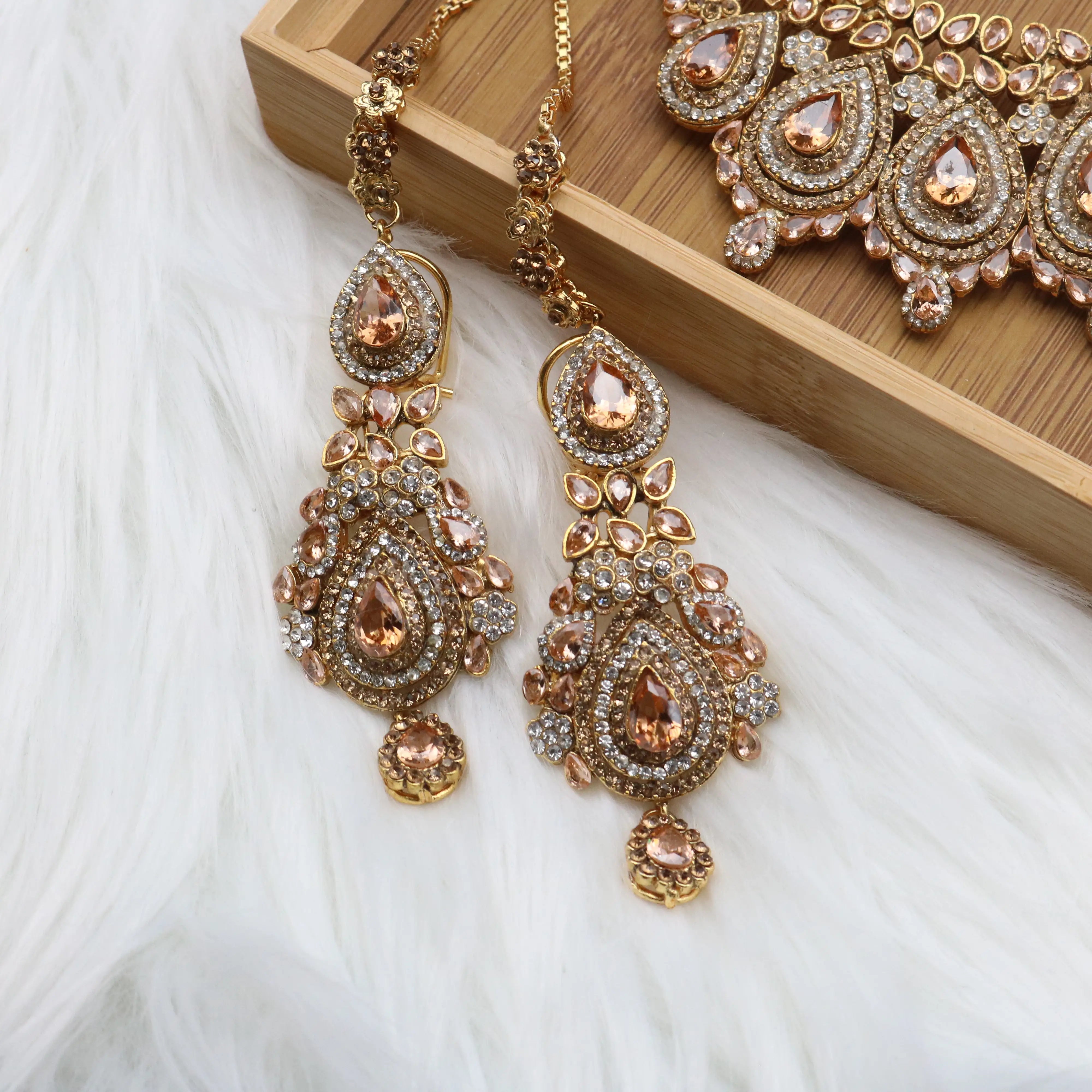 earrings view of Champagne teardrop bridal necklace set with earrings, teeka & jhoomer in stainless steel