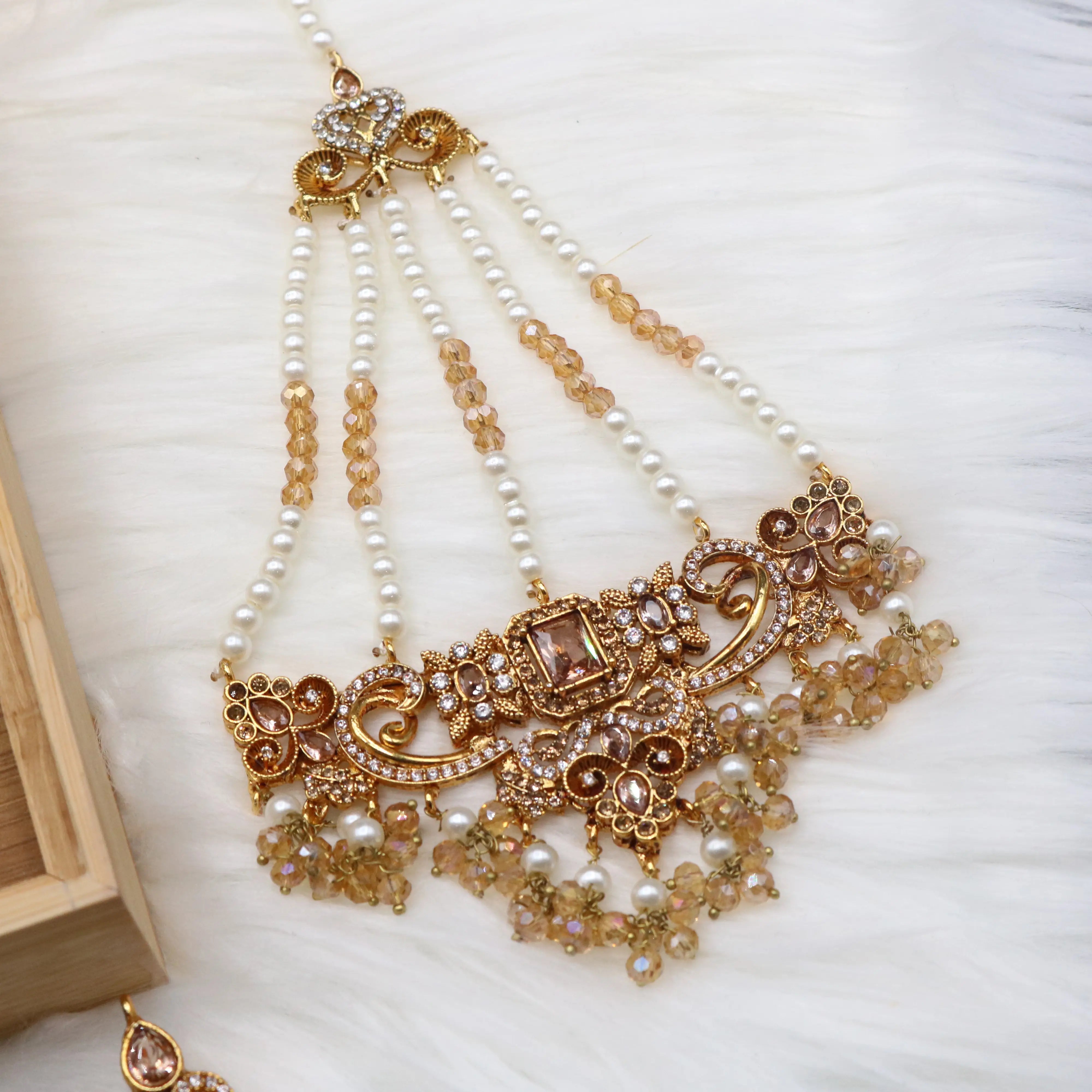 jhoomer view of Champagne gold bridal necklace set with earrings, teeka & jhoomer in stainless steel