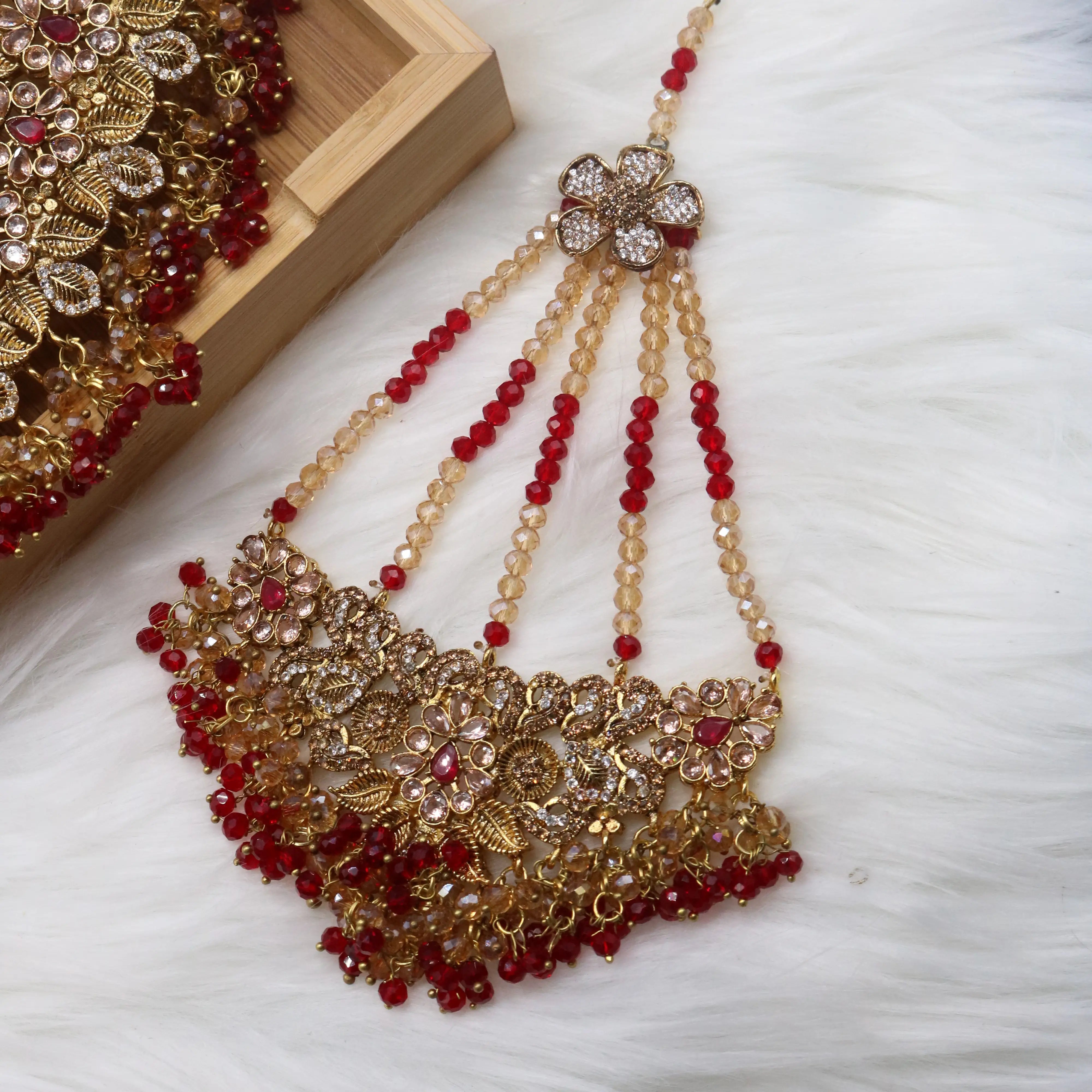 jhoomer view of Red floral bridal necklace set with earrings, teeka & jhoomer in stainless steel