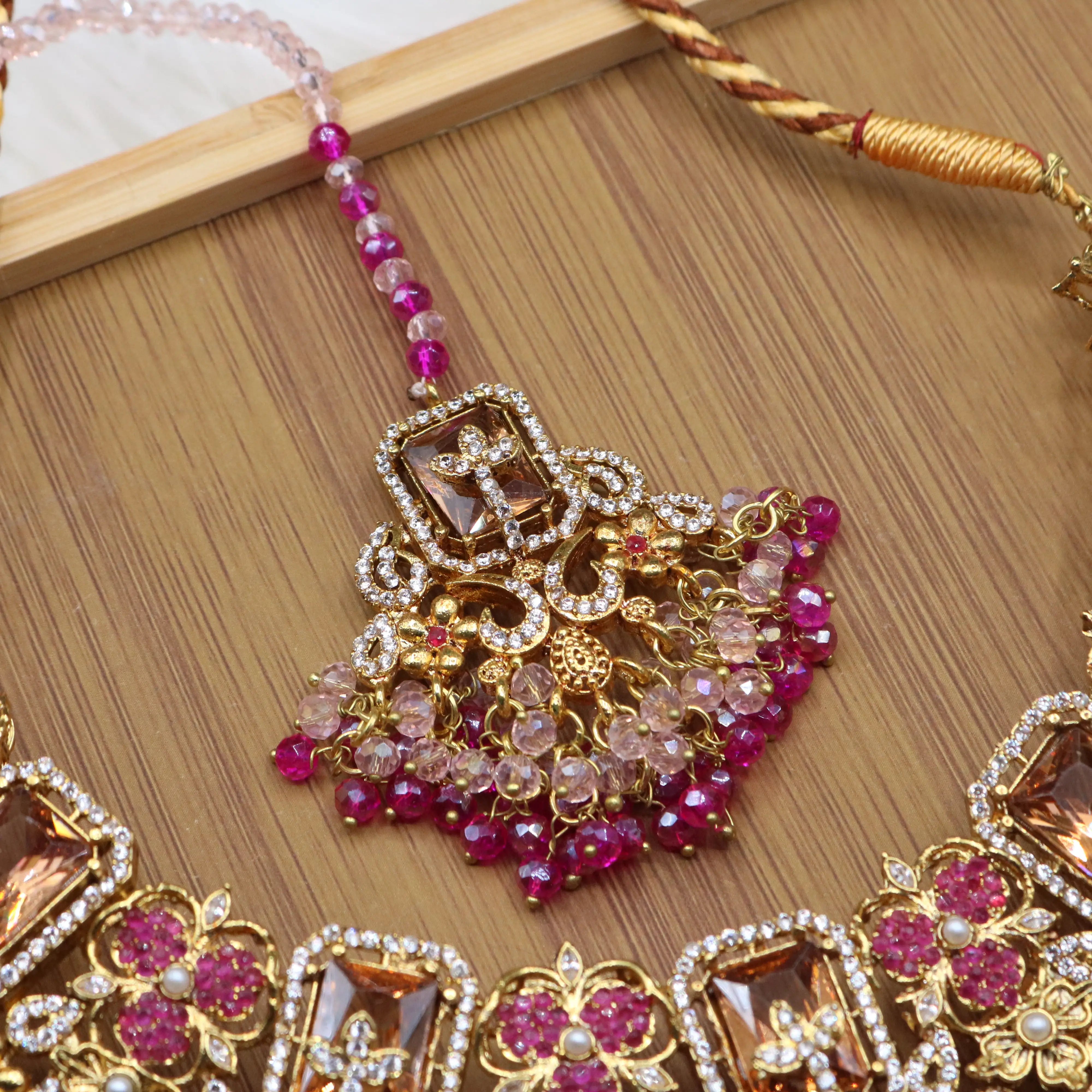 teeka view of Hot pink and champagne bridal jewelry set with necklace, earrings, teeka & jhoomer