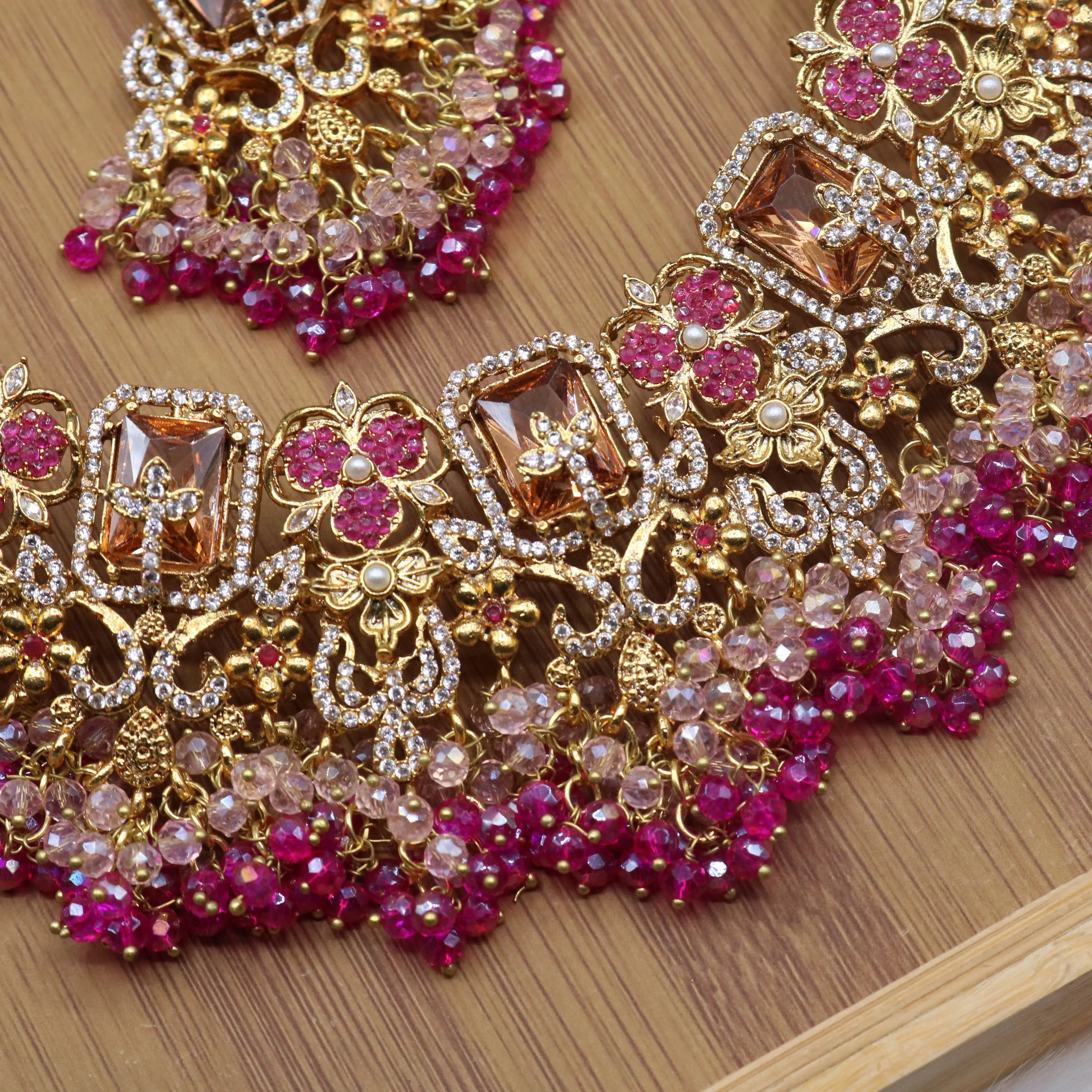 necklace view of Hot pink and champagne bridal jewelry set with necklace, earrings, teeka & jhoomer