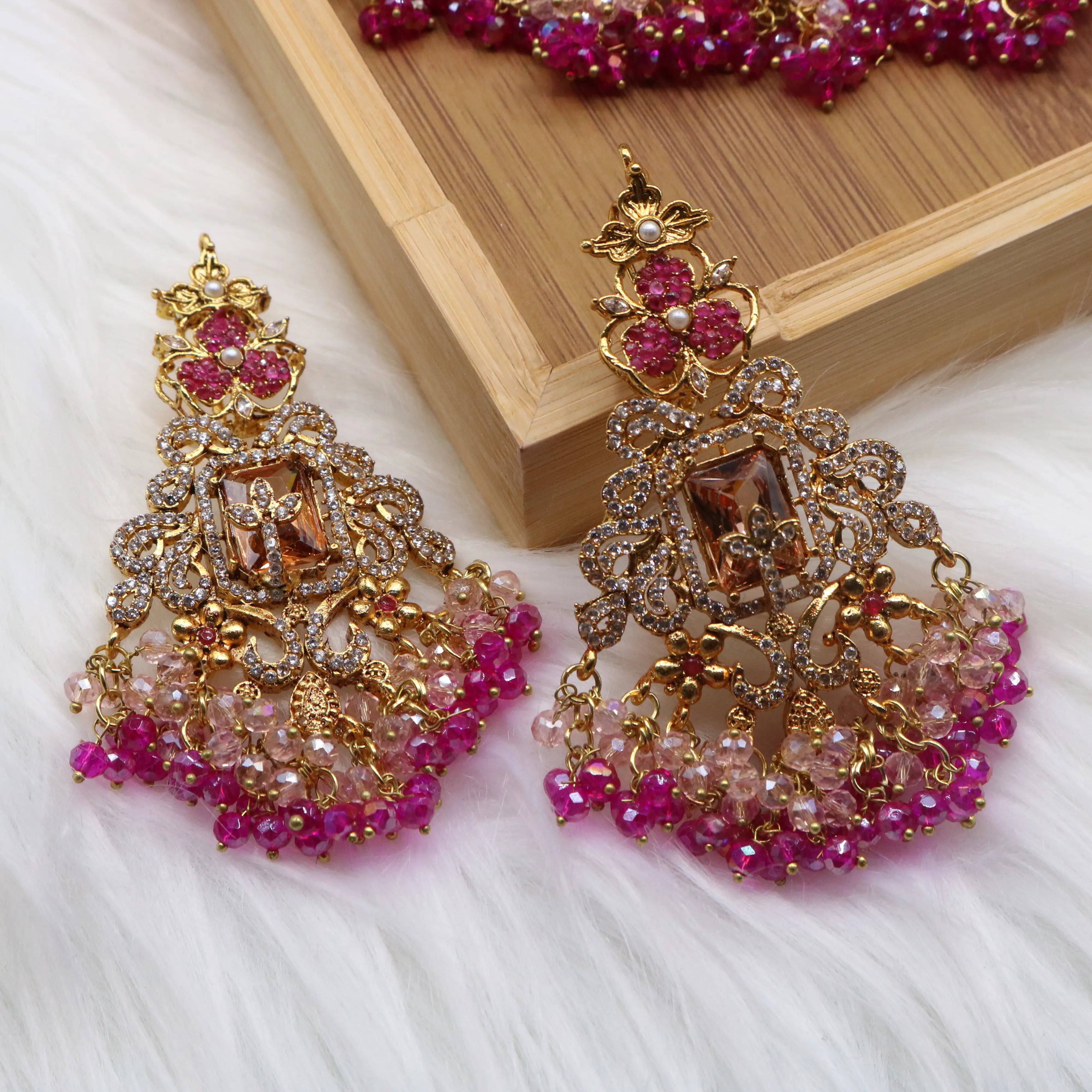 earrings view of Hot pink and champagne bridal jewelry set with necklace, earrings, teeka & jhoomer