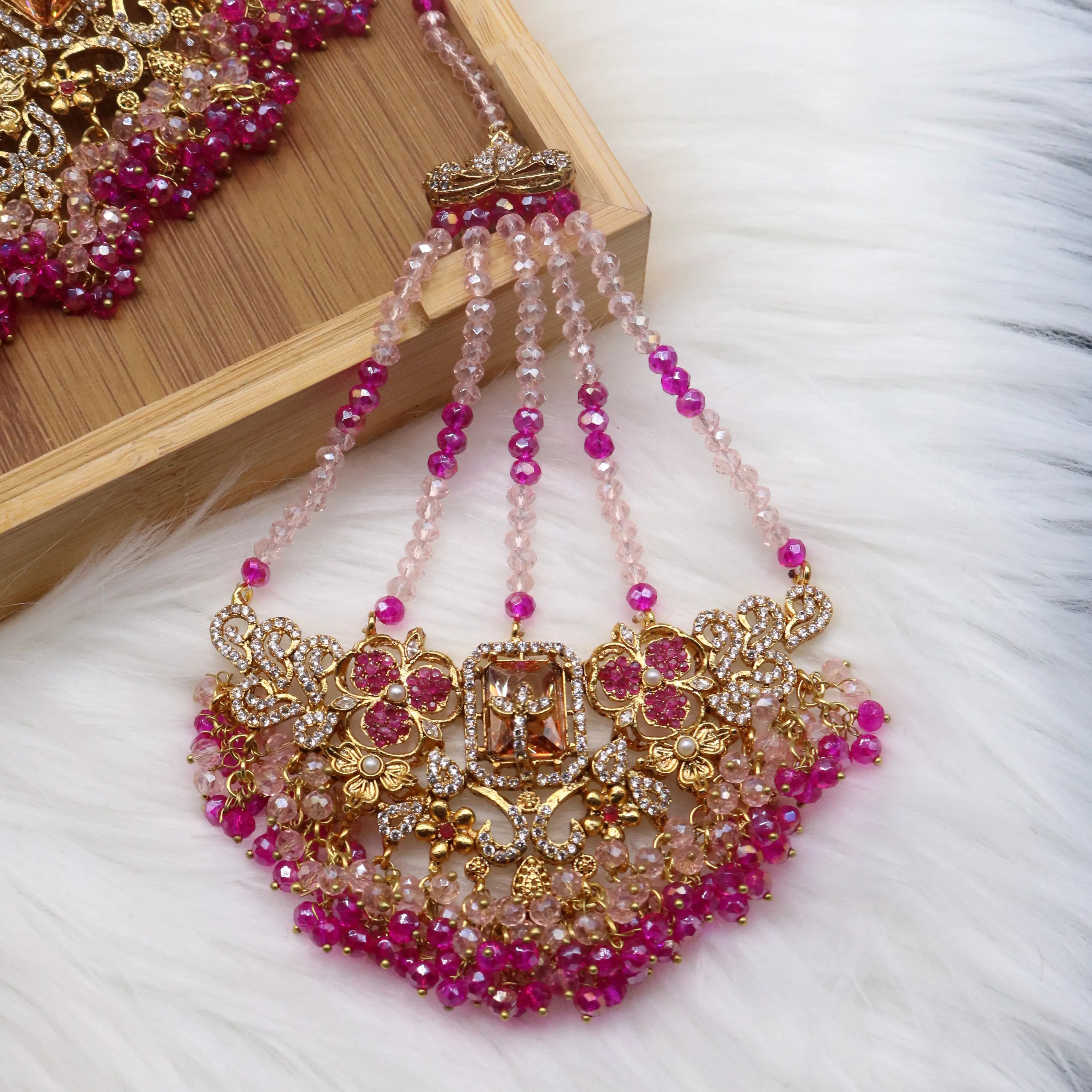 jhoomer view of Hot pink and champagne bridal jewelry set with necklace, earrings, teeka & jhoomer