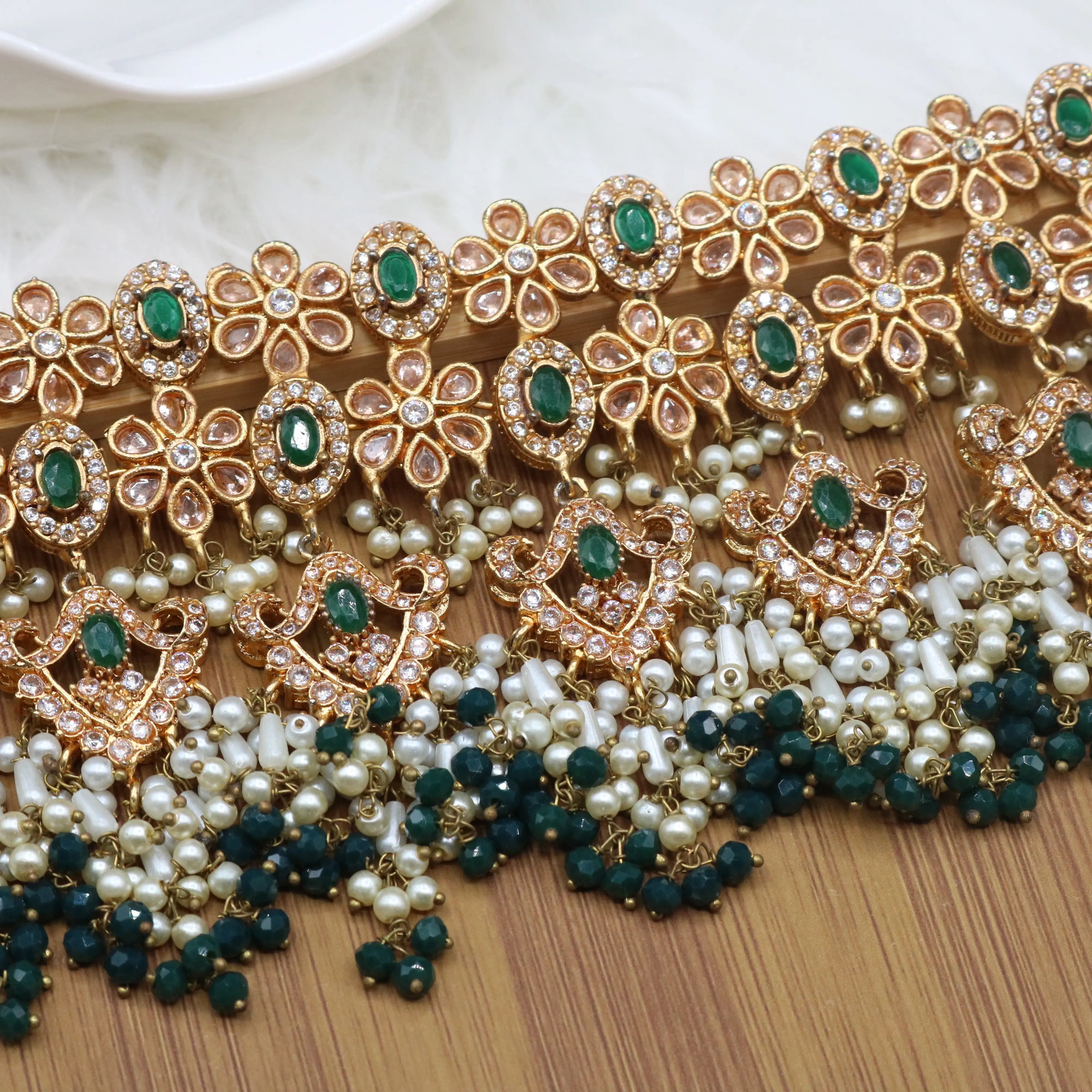necklace view of Emerald bridal choker necklace with jhumka sahara earrings, teeka & jhoomer