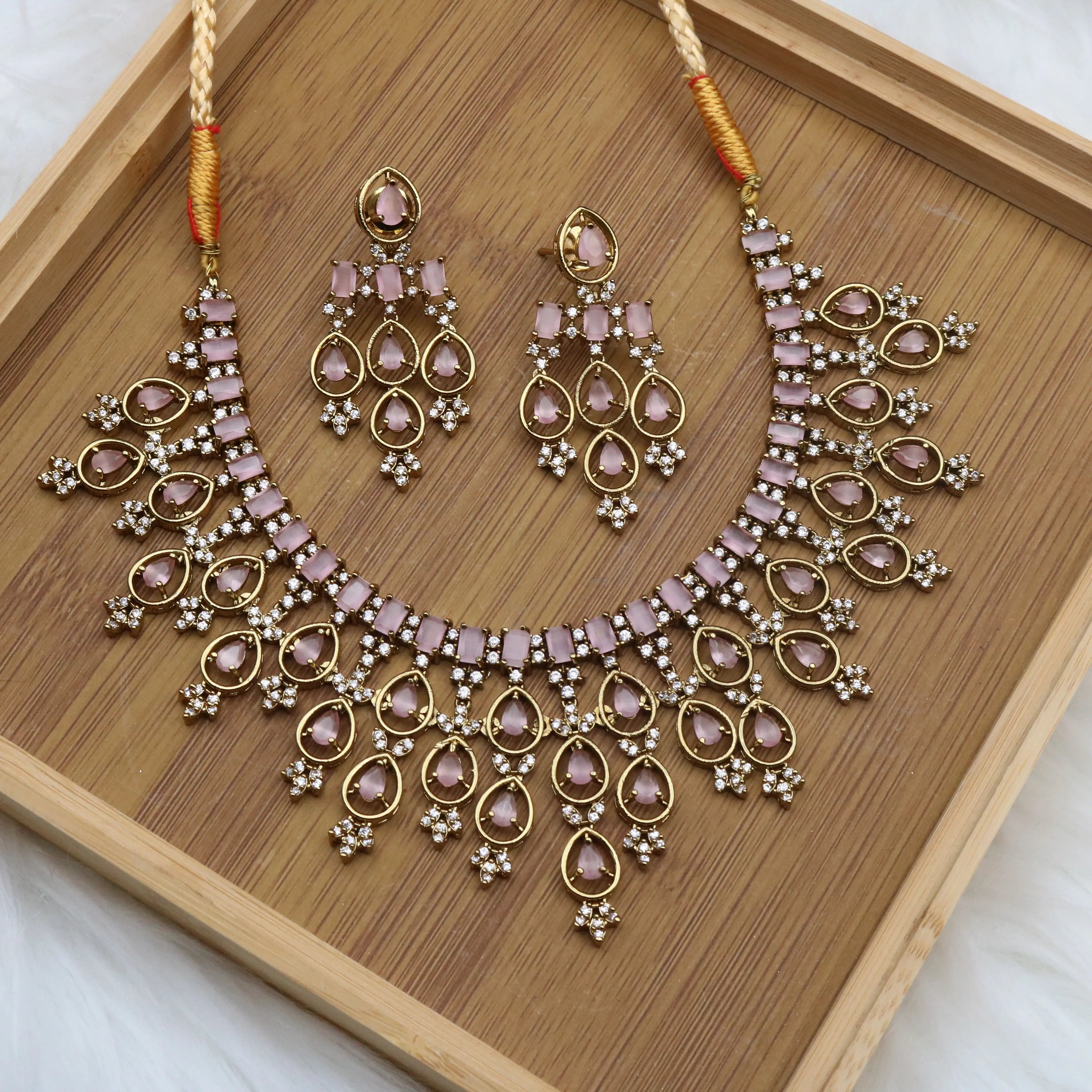 Elegant gold-plated necklace with earrings for festive occasions