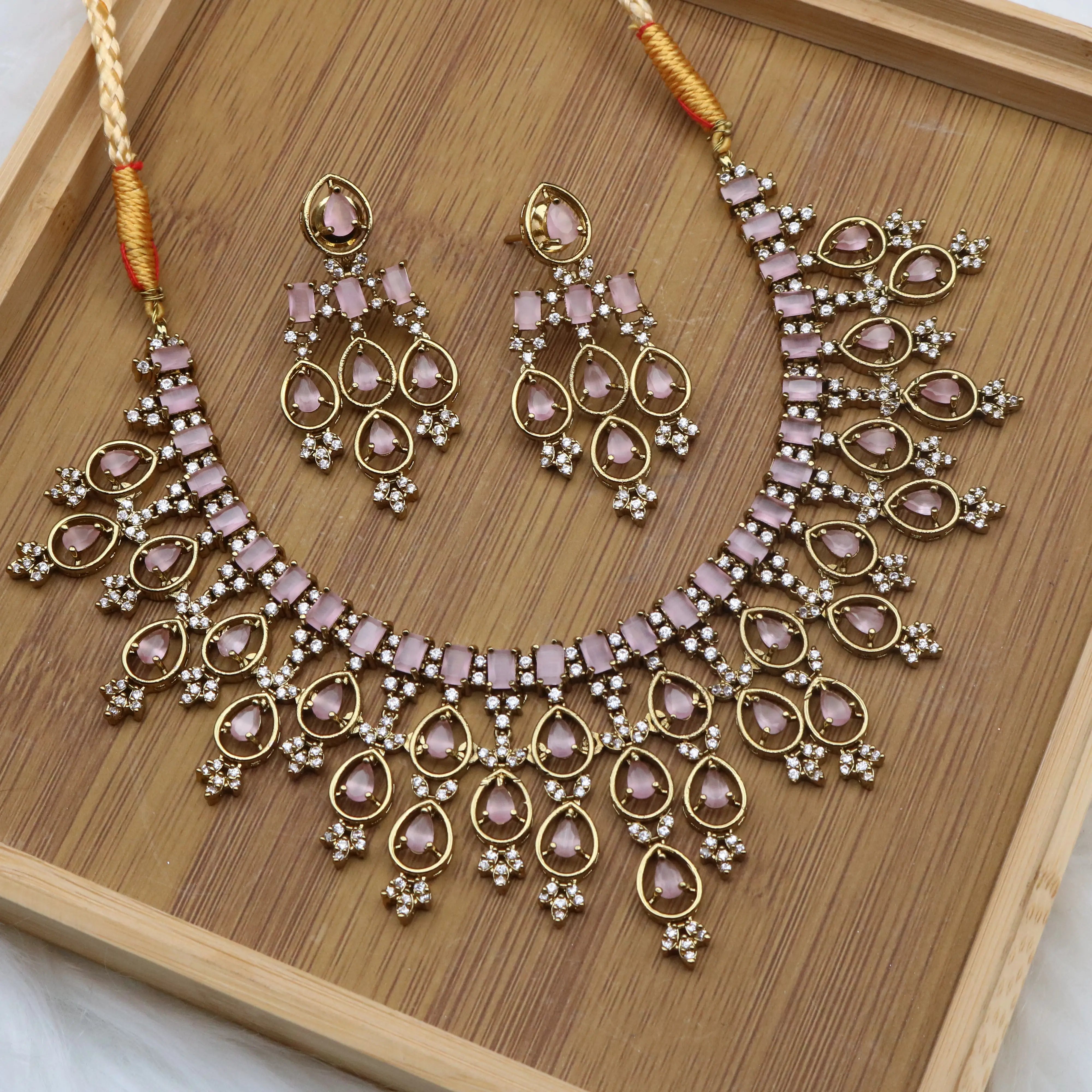Partywear necklace set with pink stones and American diamonds