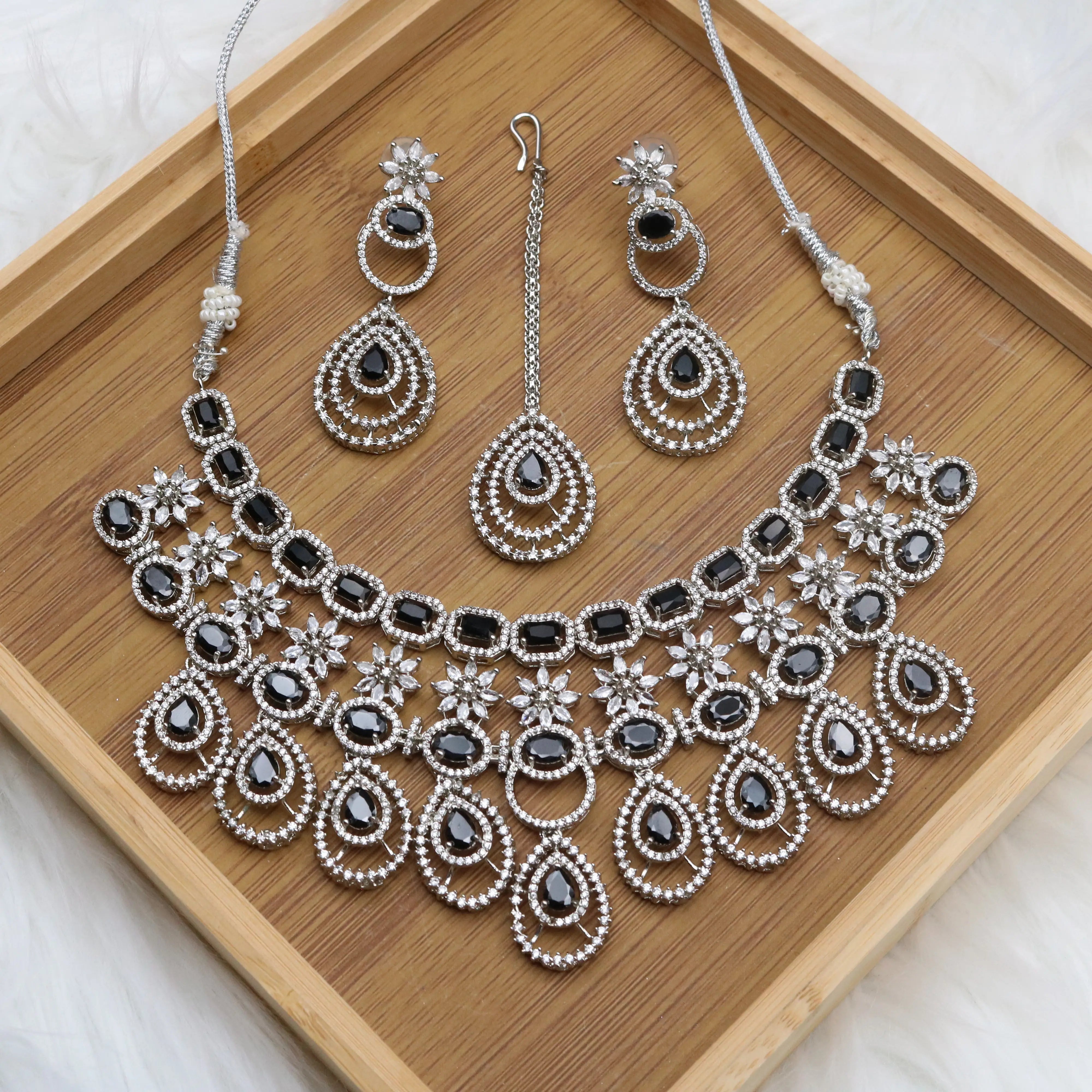 Partywear necklace set in black stones and American diamonds
