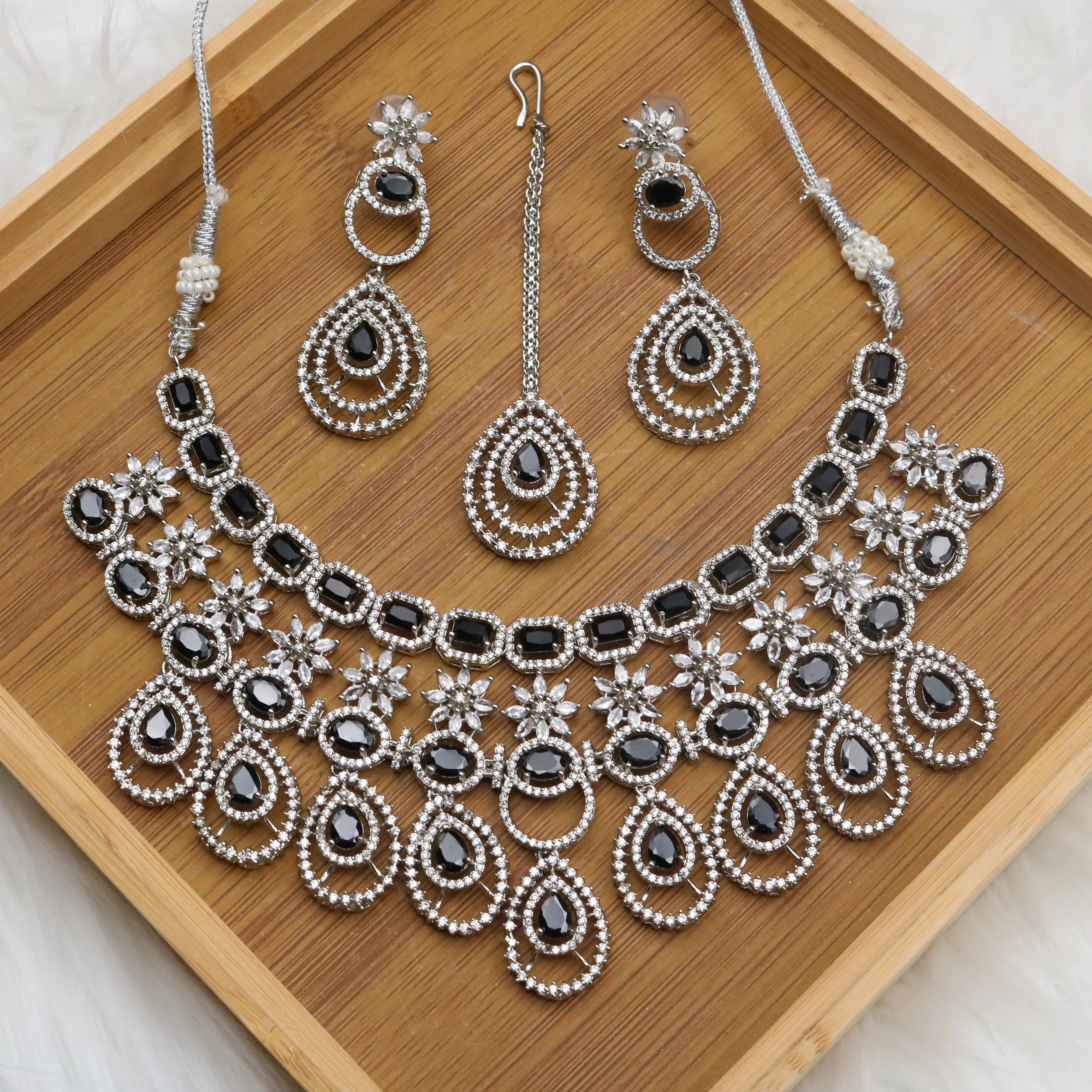Black stone necklace with matching earrings and teeka