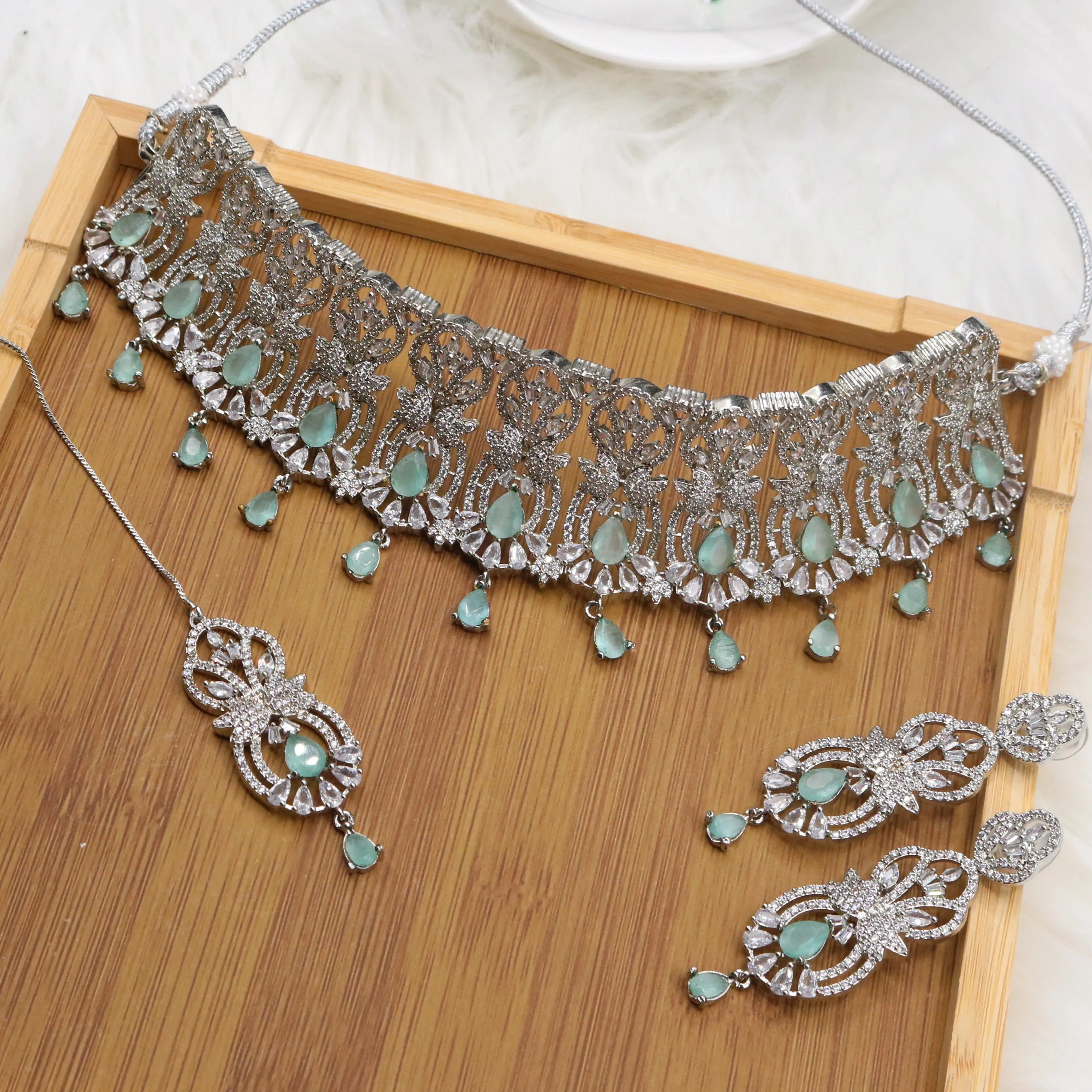 Teal necklace set with earrings and teeka