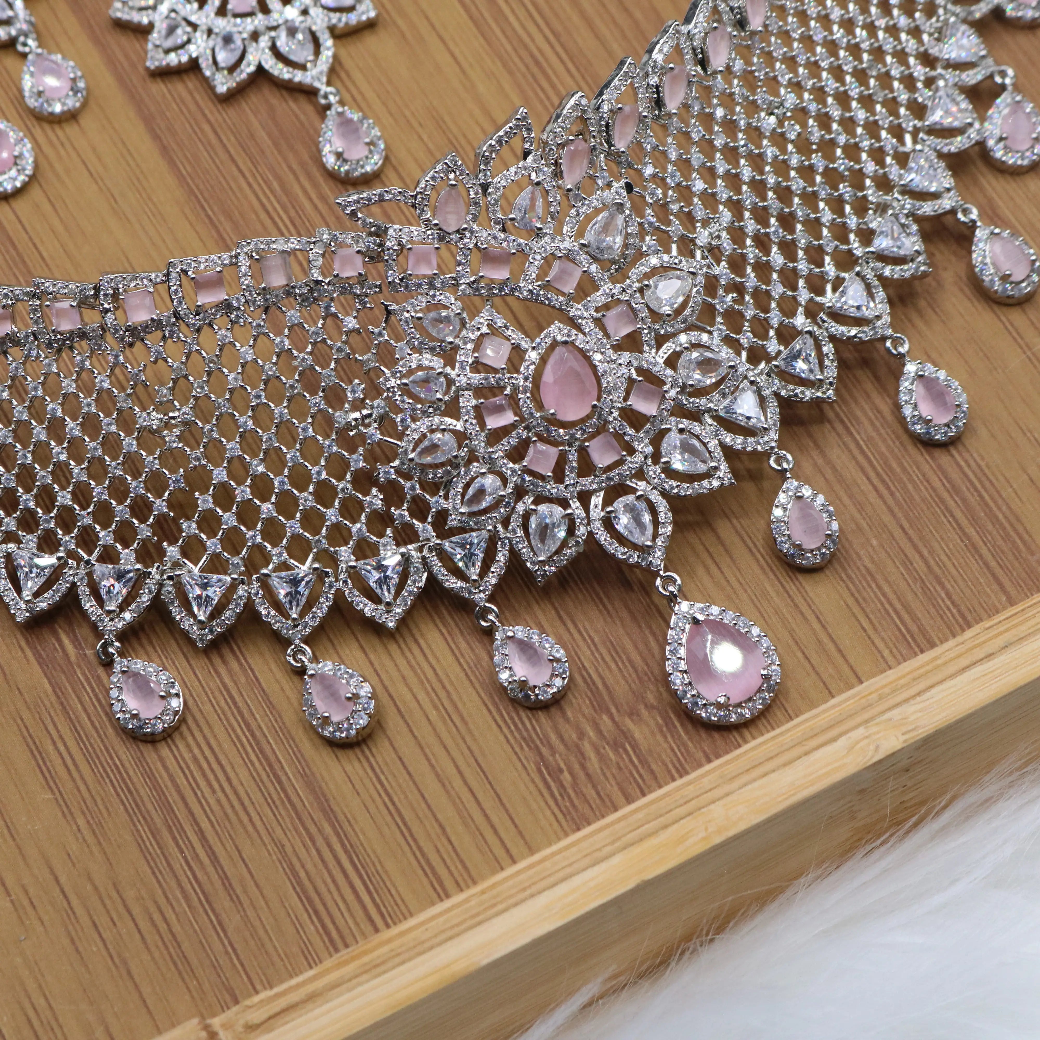 necklace view of Silver and pink bridal choker necklace set with earrings and teeka