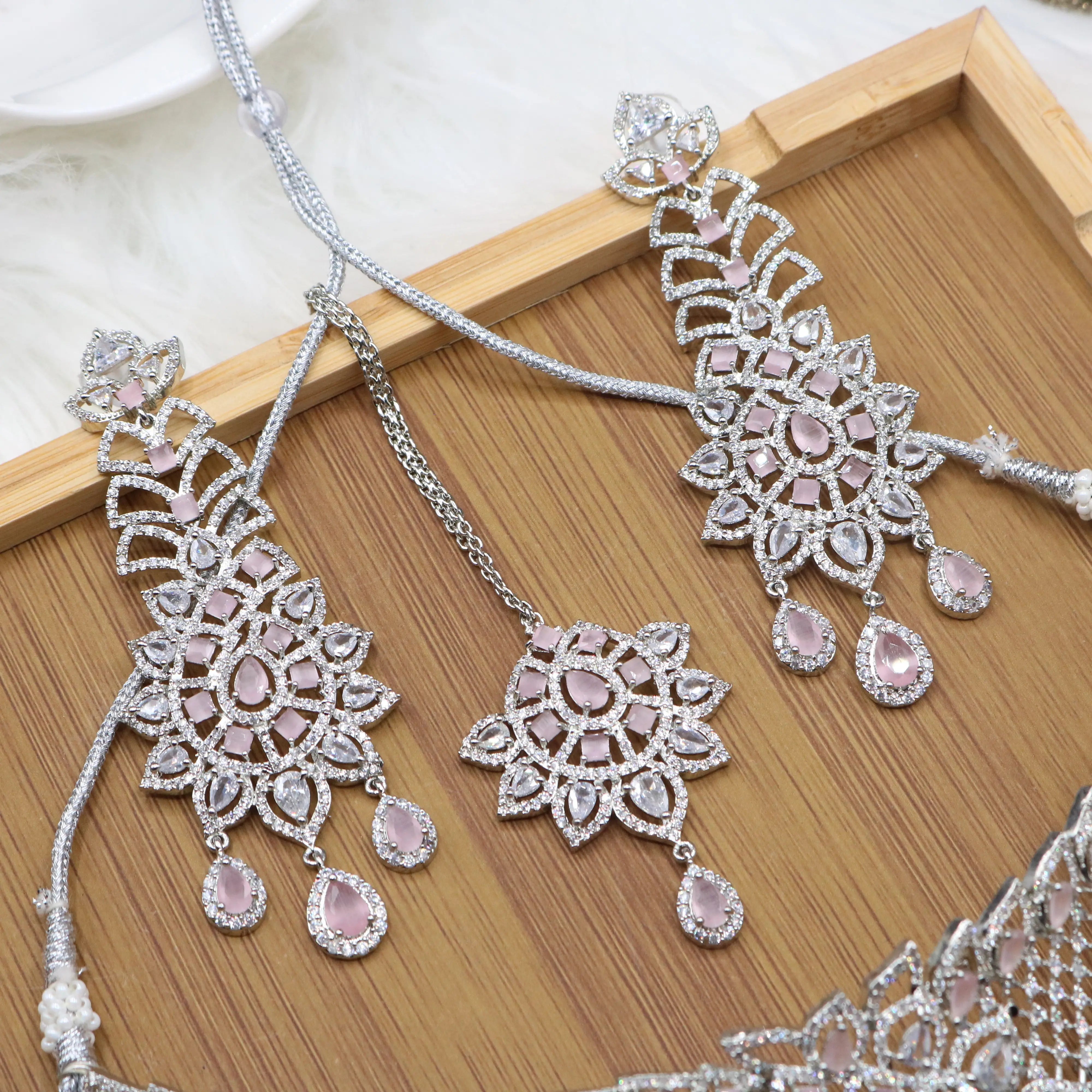 earrings and teeka view of Silver and pink bridal choker necklace set with earrings and teeka