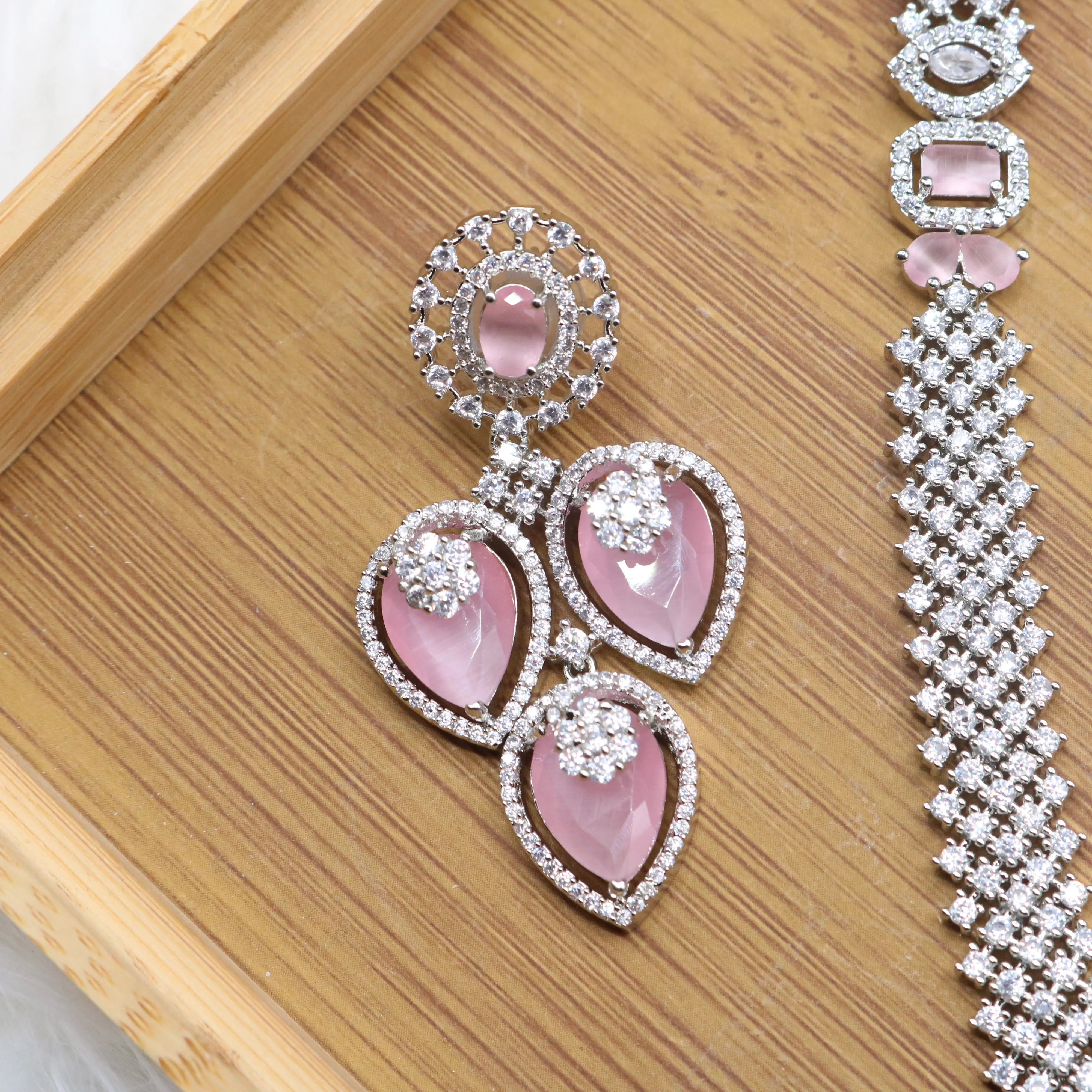 earring view of Silver and pink long bridal necklace set with earrings and teeka