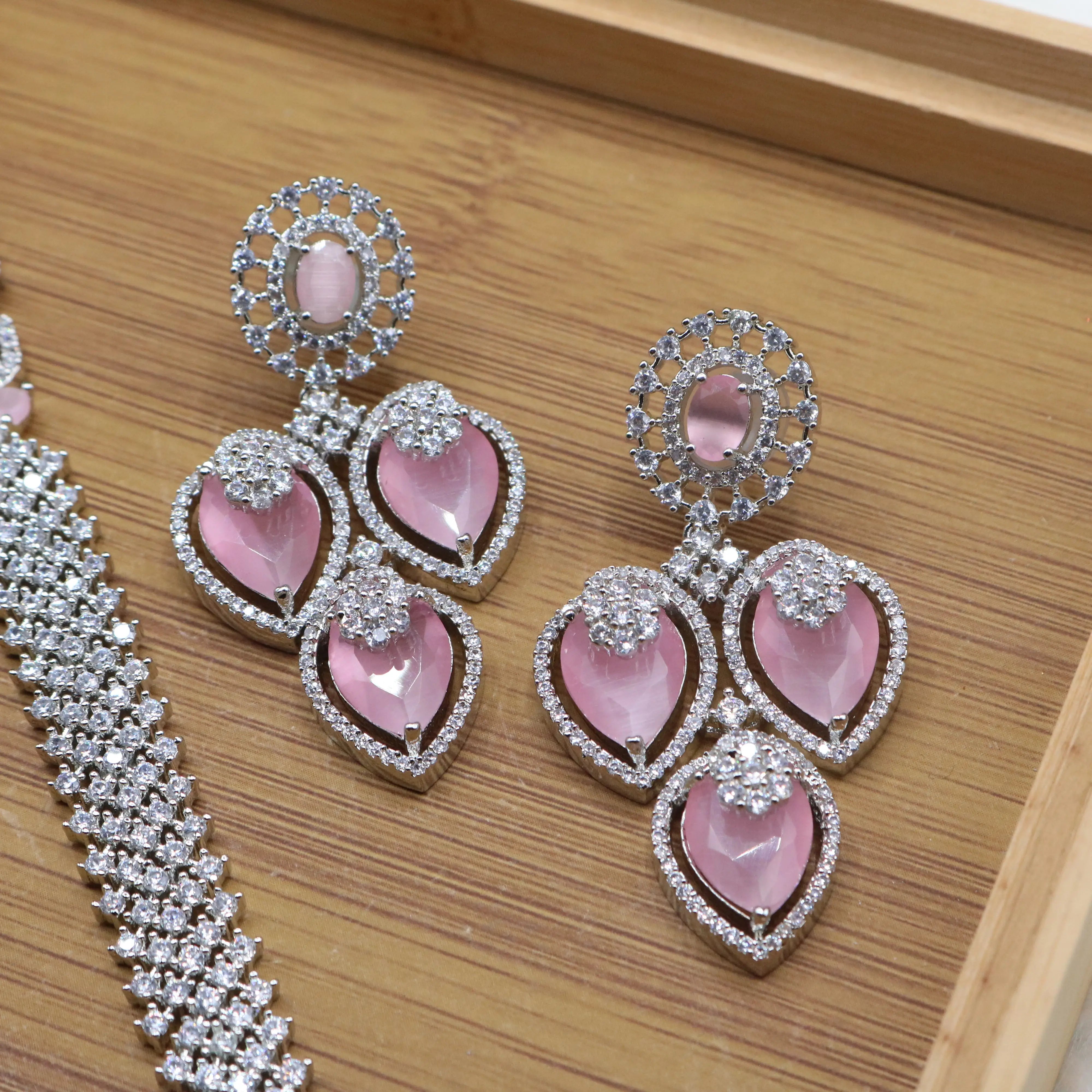 earrings view of Silver and pink long bridal necklace set with earrings and teeka