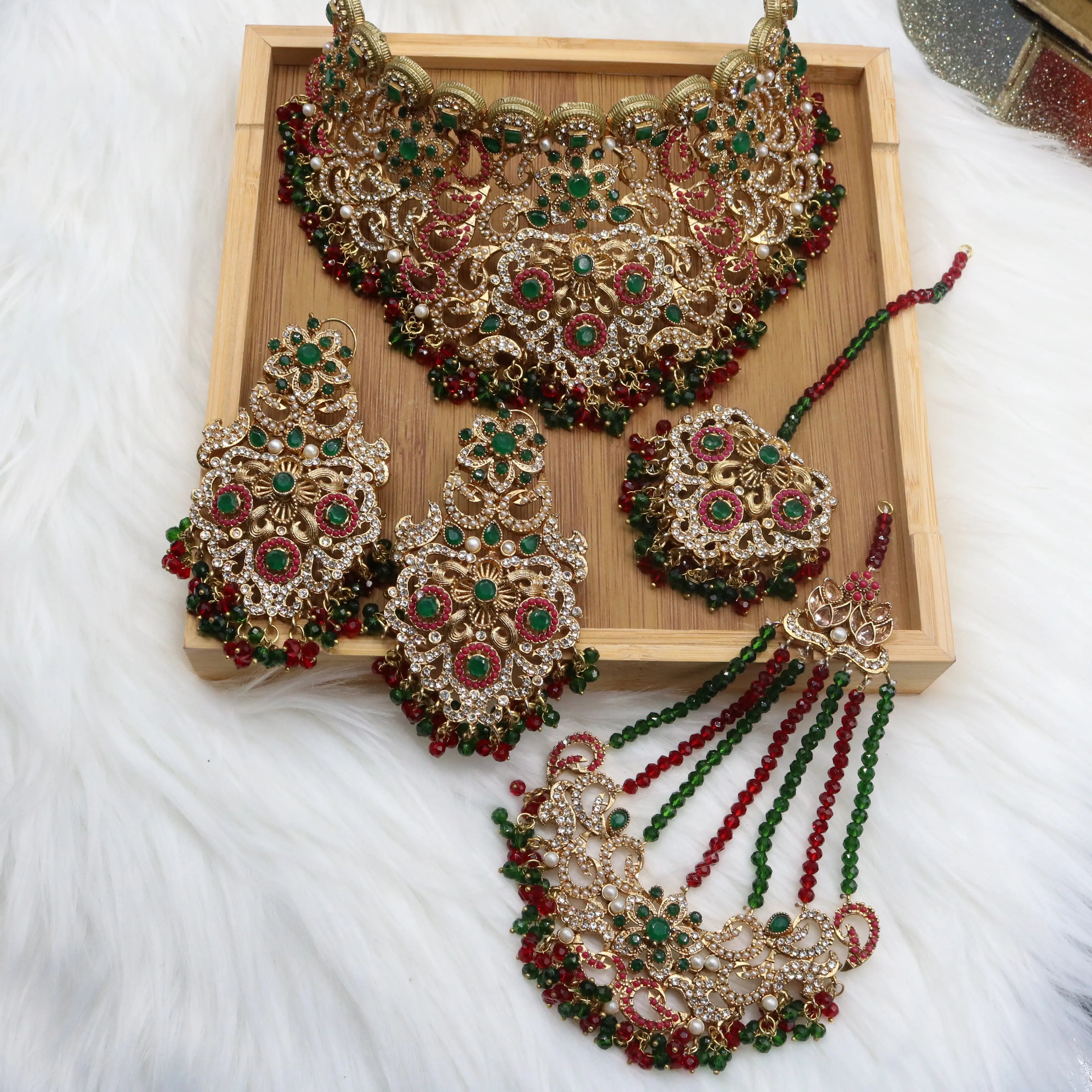 Pakistani bridal choker jewelry with emerald and ruby stones