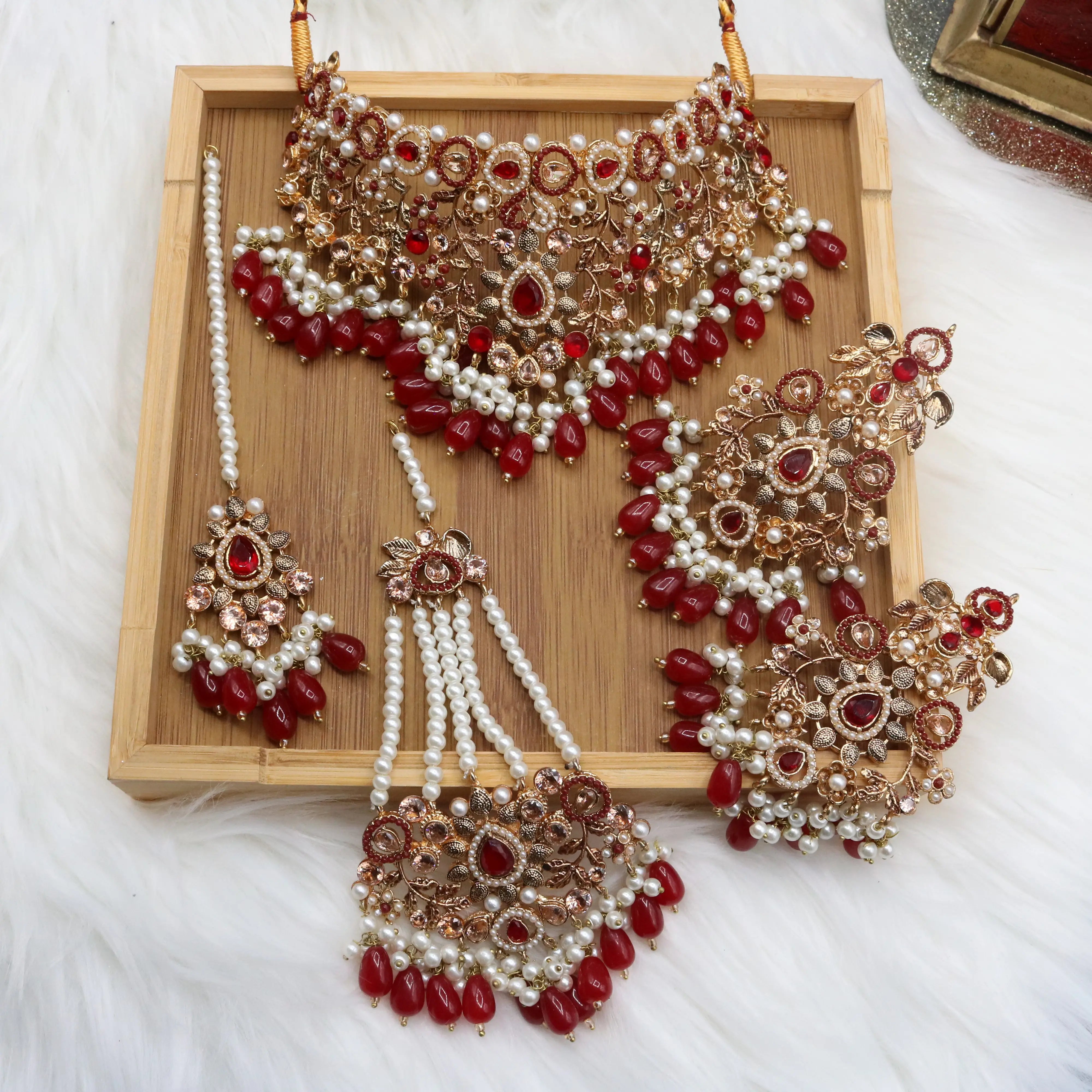Pakistani wedding choker set with red stones and gold plating