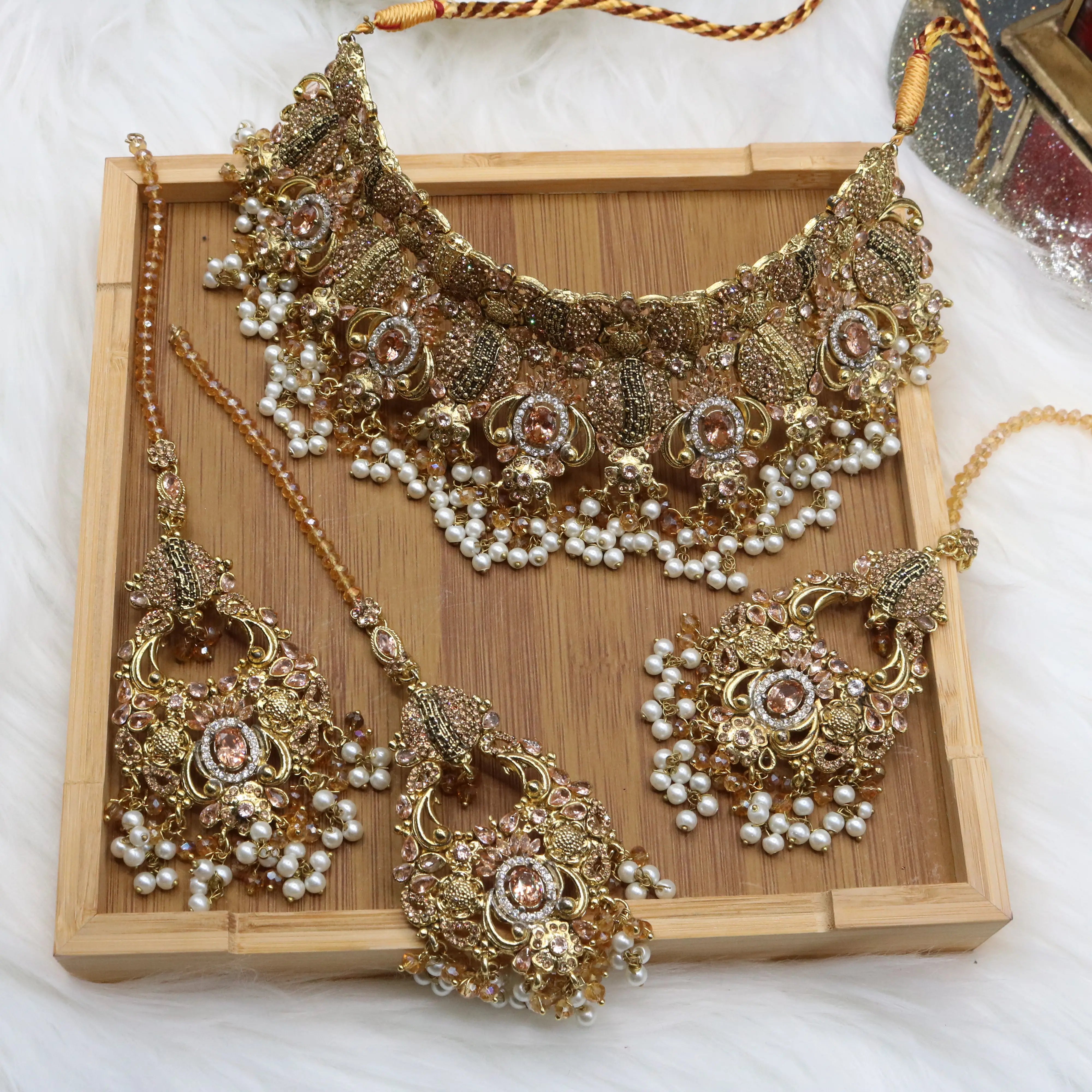 Peach Pakistani bridal choker set with pearls and gold-plating