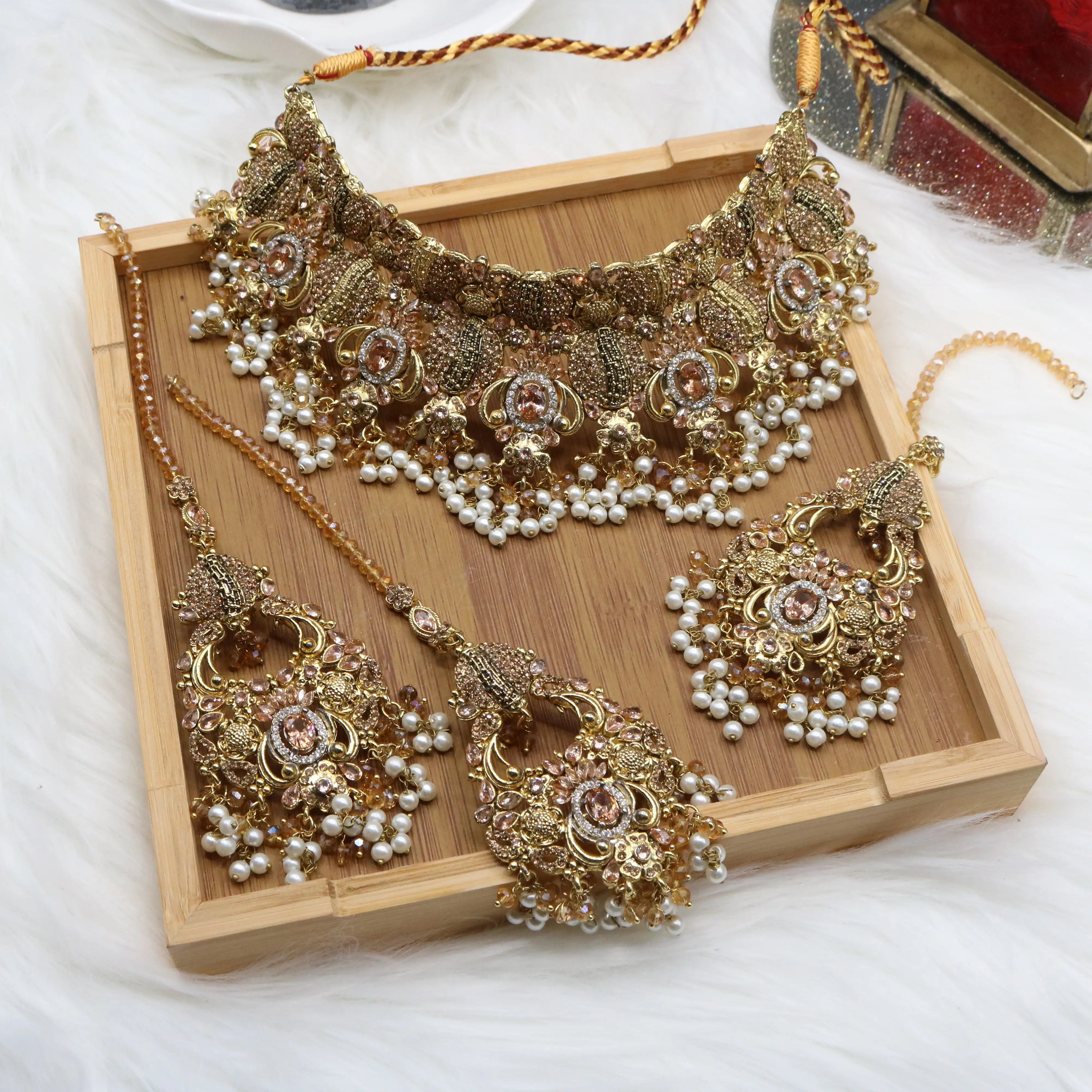 Pakistani Bridal choker necklace with earrings and teeka in peach tones