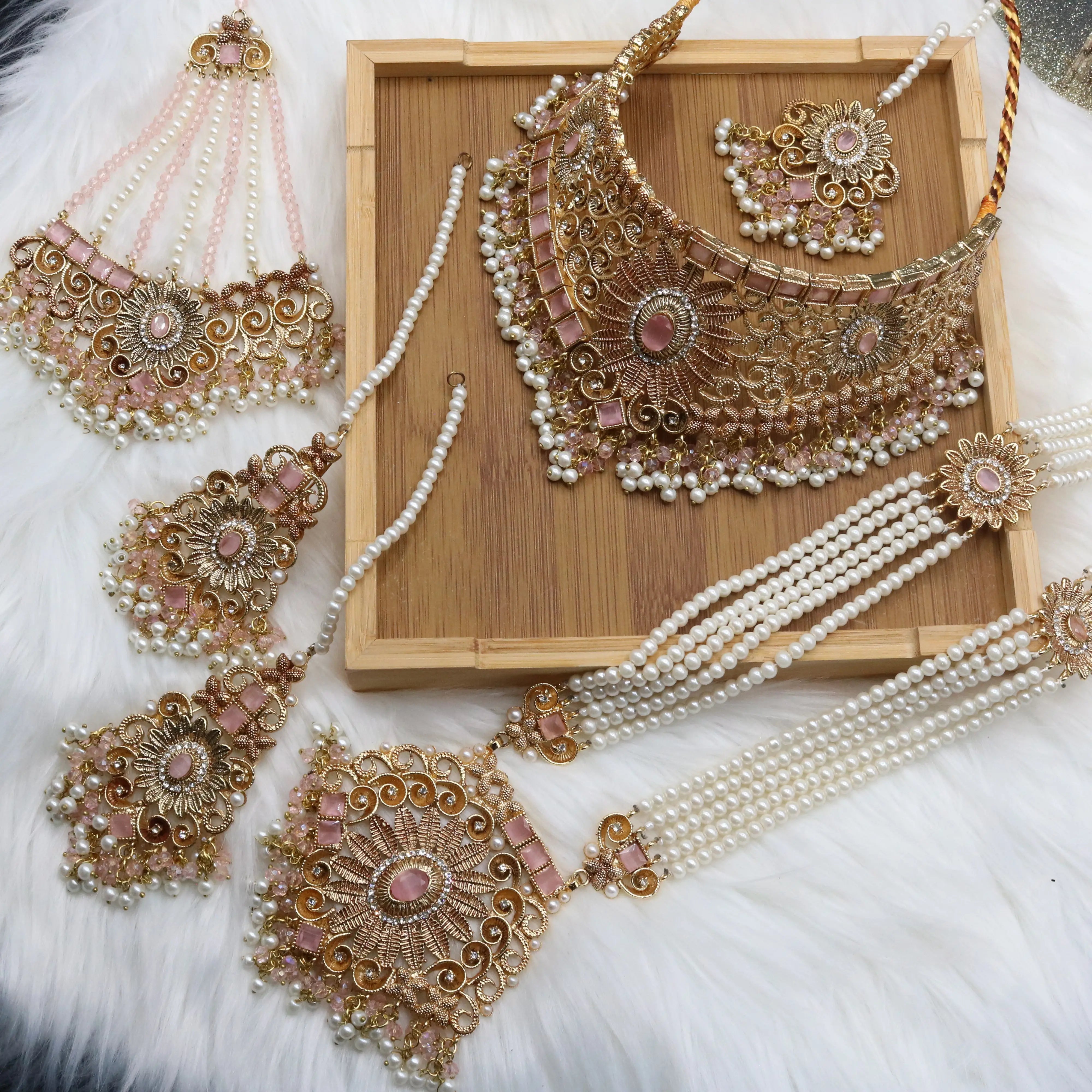 Pink and pearl 6-piece bridal jewelry set with choker, long maala, earrings, teeka & jhoomer