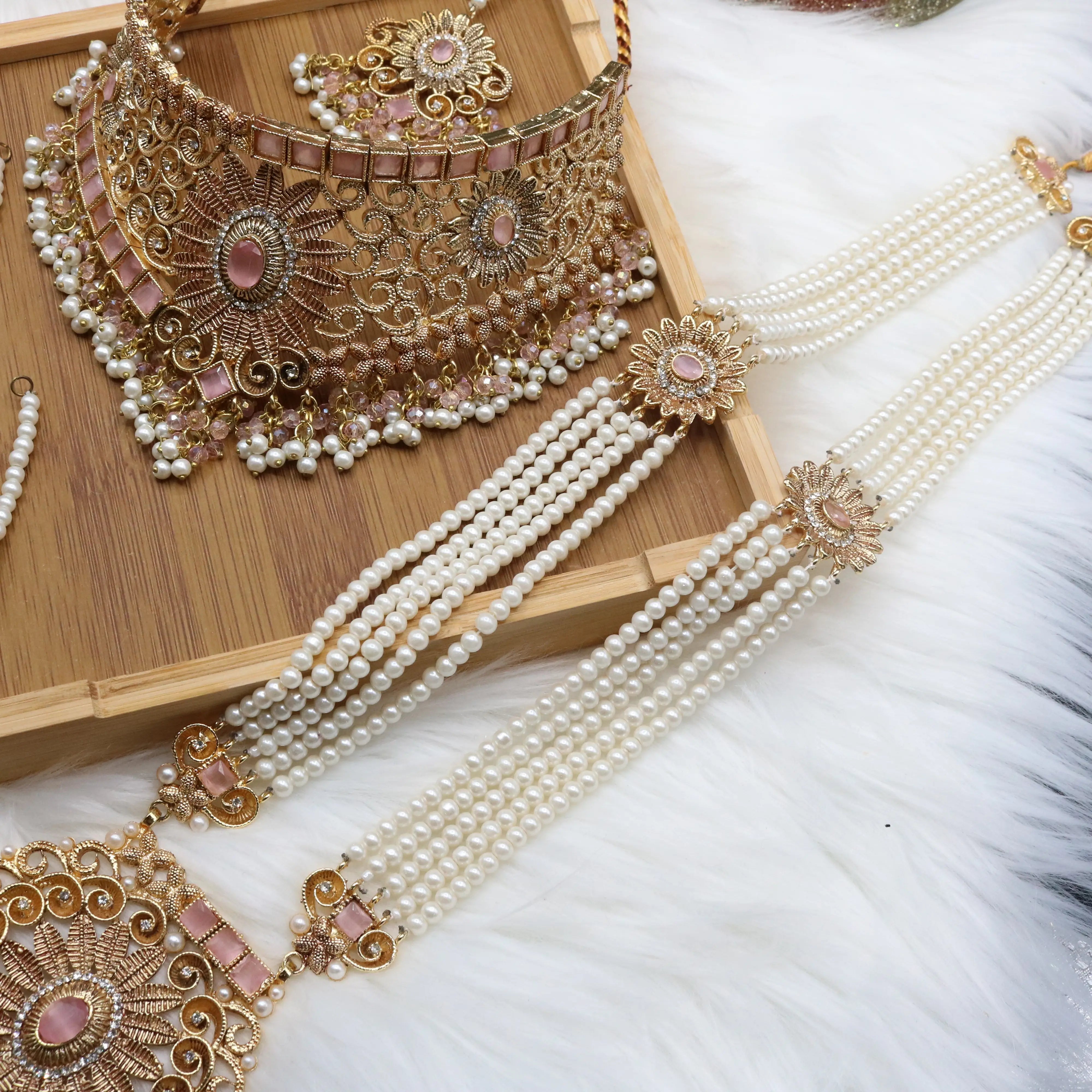 maala view of Pink and pearl 6-piece Pakistani bridal jewelry set with choker, long maala, earrings, teeka & jhoomer