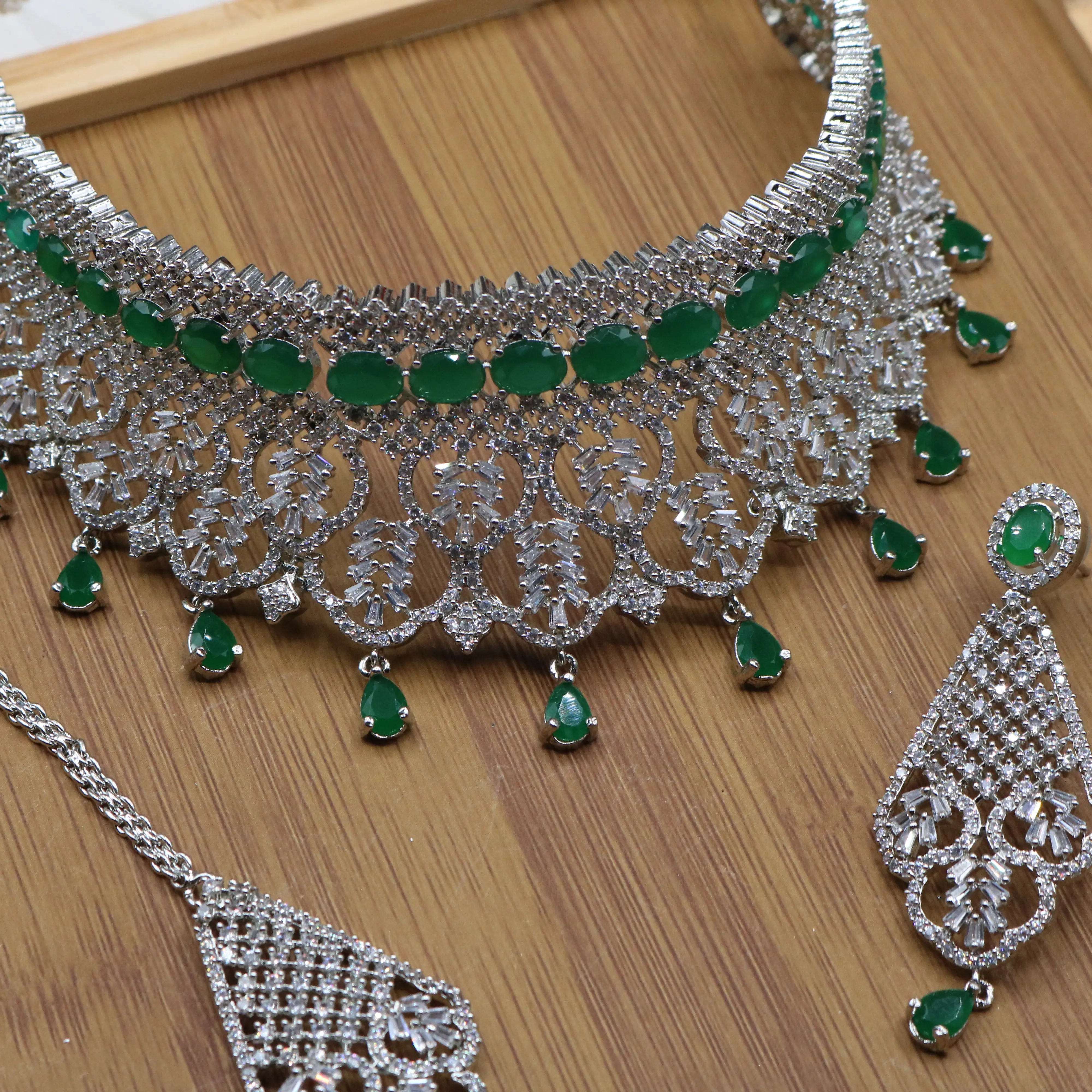 another angle of necklace of Pakistani bridal choker set with green accents